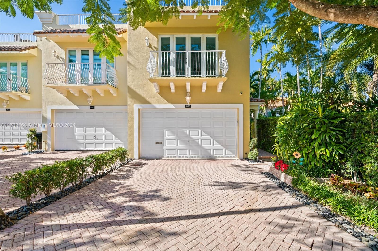 Experience the pinnacle of urban living in the heart of Victoria Park! This 2-story corner unit townhome welcomes you with a serene, secluded garden and a sense of home the moment you step inside. Start your day on the screened-in porch, enjoy the sounds of nature, or take a swim in your rare, private 40' heated lap pool, a rare amenity. The 1st flr boasts a spacious, open-concept layout. Upstairs, 3 lg bedrooms, 2 full baths. 3rd bdrm is currently configured as a home office, perfect for remote work. For those who love to entertain, the rooftop terrace offers views of the downtown skyline. Add'l features two-car garage w/ ample storage. Walk or golf cart to Las Olas Blvd, this home puts you at the center of E. Ft Lauderdale. Move in today and embrace the lifestyle of Victoria Park!