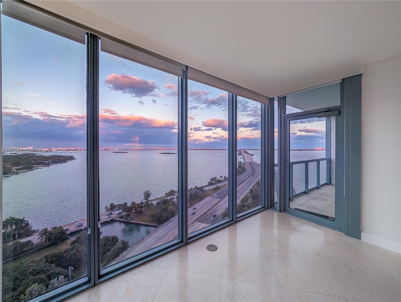 Wake up to breathtaking views of Biscayne Bay in the best 1-bedroom, 1.5-bath unit in the building! The coveted 11-line offers superior water views and semi-private elevators for added privacy. This condo boasts marble floors, an upgraded washer and dryer, a huge walk-in closet, a linen closet, dual sinks in the master bath and a large storage locker. Enjoy a modern kitchen with granite countertops and stainless steel appliances. Amenities include two pools, a sauna, steam room, gym rivaling professional facilities, movie theater, party room, business center, lounge, and BBQ area. A new elegant lobby is underway. Includes 1 assigned parking space + 1 additional valet space for owners only. Close to Midtown Shops, Design District, with easy access to highways, Miami Beach, and the airport.