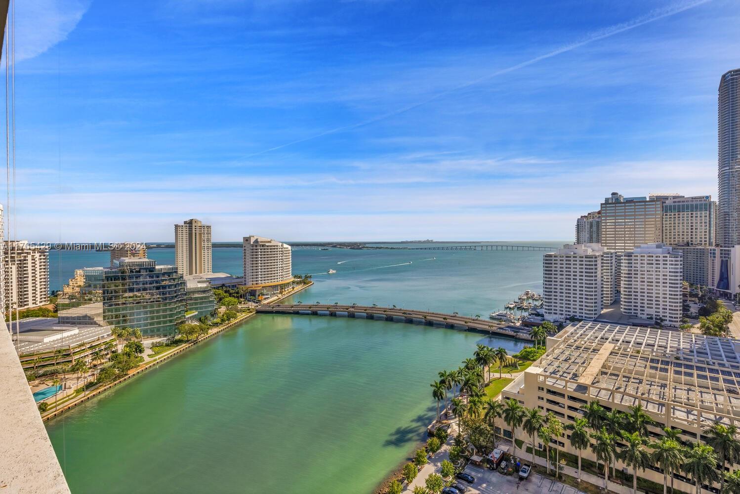 Enjoy direct Bay views through stunning 16-foot floor-to-ceiling windows in this luxurious residence, perfectly located between Mary Brickell Park and Miami Circle Park. The newly redesigned master bathroom features Brizo fixtures, a custom vanity, and premium porcelain flooring. The remodeled kitchen is equipped with Subzero and Wolf appliances. Custom closets in both bedrooms, Hue smart lighting, and pet-friendly living complete the home. Resort-style amenities include a 2-acre pool deck, 200-foot pool, spa and fitness facilities, a theater, golf simulator, three acclaimed restaurants, 24-hour concierge, and valet.