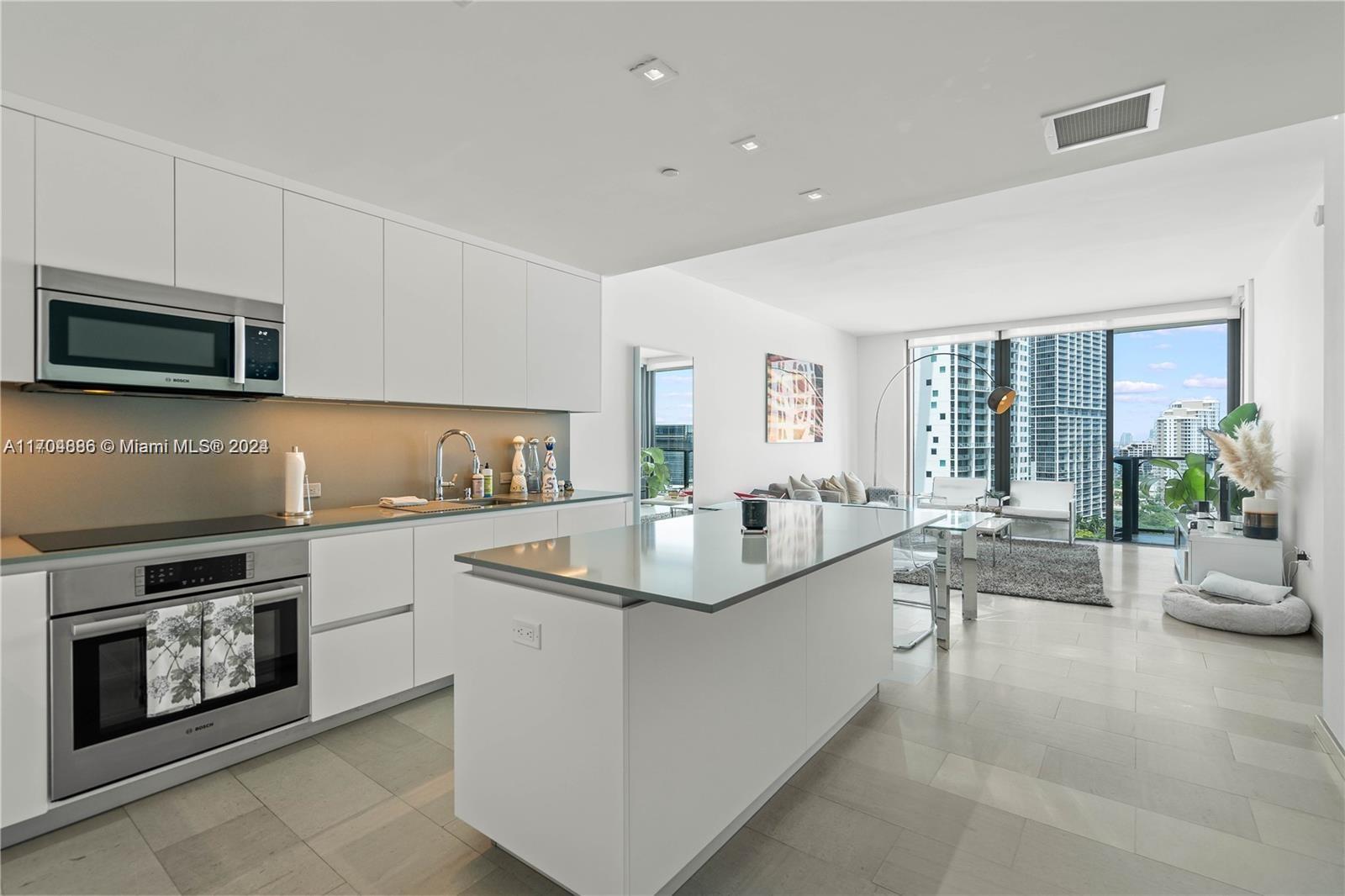 Step into luxury living in this beautifully furnished and decorated 1-bed, 1.5-bath apartment in the heart of Brickell City Center. Boasting breathtaking east-facing views, this residence is meticulously styled with Tui Lifestyle furniture and modern finishes.
The sleek Italian kitchen cabinets and bathrooms by Italkraft add a touch of European elegance, features like a 48-bottle temperature-controlled wine storage and floor-to-ceiling sliding glass doors that flood the space with natural light.
Enjoy resort-style living with access to a half-acre amenity deck featuring tropical gardens, BBQ grills, two swimming pools, an outdoor and indoor fitness center, and a children’s play area. The building offers 24/7 valet service, and the unit includes one assigned parking space.