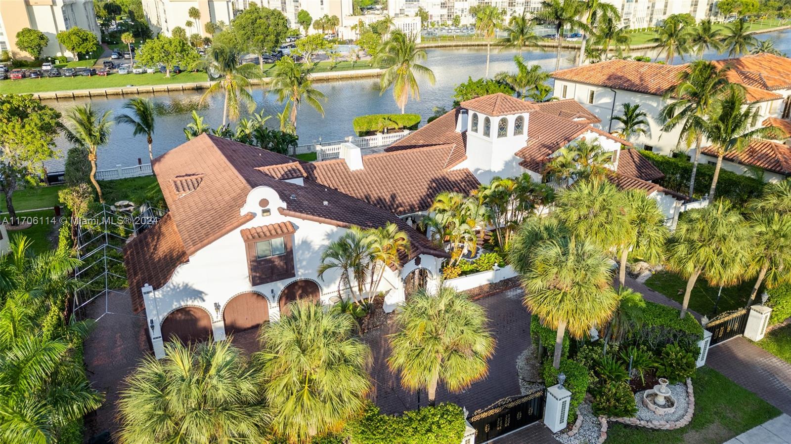 Luxury living in this Waterfront Mediterranean Estate in prestigious Diplomat Golf Estates. Set on a 1/2 acre lot with 143 ft of waterfront, this 8,400+ sq. ft. estate offers direct ocean access via a 30-ft deep, 250-ft wide canal and a private dock for a 75-ft yacht. Perfect for boaters, golfers, and beach lovers, it’s just minutes from the renowned Diplomat Golf Course.

Enjoy resort style amenities: A pool, hot tub, steam room, sauna, and lush landscaping. The home features a gated entrance, 3 car garage, circular driveway, oversized master suite with dual walk-in closets, and a chef’s kitchen with stunning water views. The executive office/library completes this dream home.