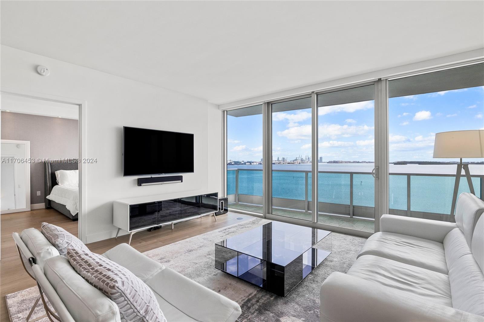 Discover luxury living in this 2 Bedroom + Den/3 Bath condo at the prestigious Jade Residences. With 1,730 sq. ft. of interior space, a spacious balcony, and breathtaking Biscayne Bay views, this residence is a masterpiece. The porcelain floors and floor-to-ceiling glass windows create a bright, elegant space. The spa-like master bath offers marble floors, a Jacuzzi tub, and a glass-enclosed shower. Includes 1 assigned parking space, 1 valet space, and 1 storage cage. Amenities: fitness center, sauna, steam rooms, business center, rooftop lounge, and 24-hour concierge. Live where luxury meets convenience!