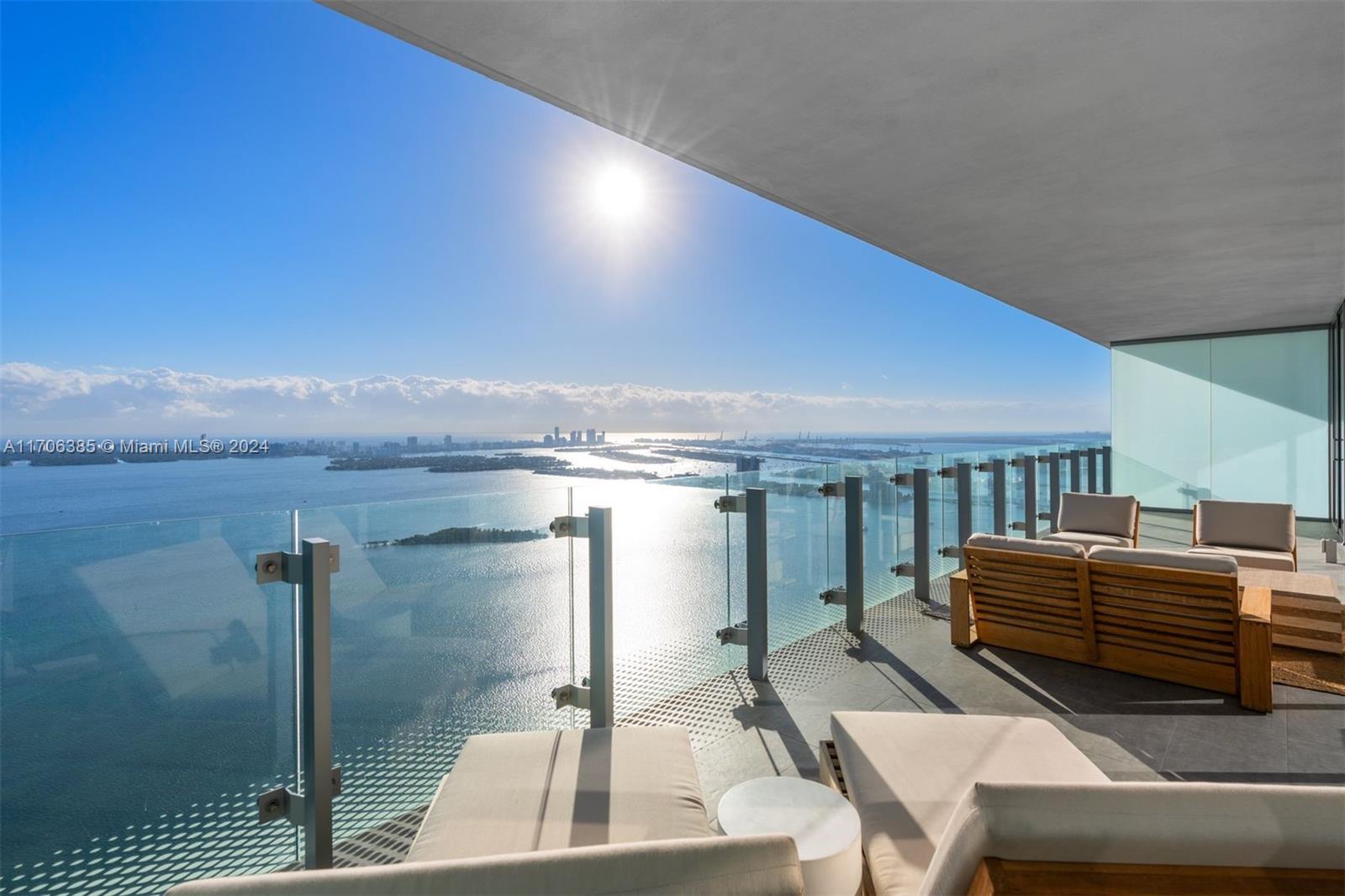 This exquisite 2-bedroom + den, 3.5-bathroom residence offers nearly 2,500 sq ft of sophisticated living space with breathtaking direct east-facing views of Biscayne Bay. Elegant interiors feature custom Italian cabinetry, premium appliances, and floor-to-ceiling windows, flooding the space with natural light. The expansive 500 sq ft, 10’-wide balcony provides unobstructed bay views, perfect for relaxation or entertaining. The primary suite boasts a spa-like bathroom and a spacious custom-designed closet. Residents enjoy world-class amenities, including an infinity-edge pool, fitness center, spa, tennis courts, and more. Ideally located just minutes from Miami Beach, the Design District, Wynwood, and Downtown, this is modern Miami luxury at its finest.