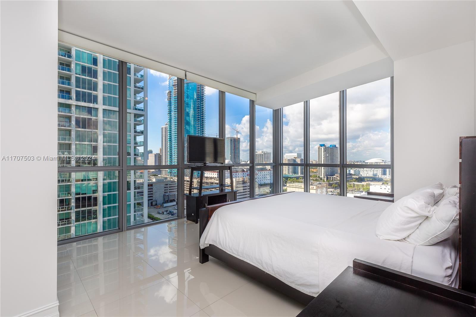 This stunning 2-bedroom, 2.5-bathroom condo offers breathtaking views of Biscayne Bay, the ocean, and the city skyline. Featuring a European-style kitchen with top-of-the-line, luxurious appliances, it’s designed for modern living. Enjoy a large private balcony, new bathroom floors, and spacious walk-in closets. The residence also includes private elevators for added convenience and privacy. Located in a full-service luxury building, residents have access to a wide range of premium amenities. The property is ideally situated on Biscayne Blvd, directly across from museums and the Performing Arts Center, just minutes from the beaches, the airport, and Brickell.
A must-see property for those seeking the ultimate in luxury living!