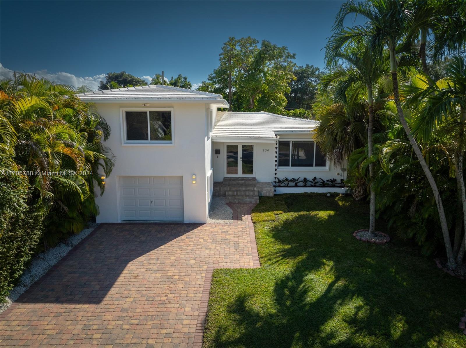 Modern, updated and located in Coral Gables! This 3 bed/2 bath home is move-in ready including fresh paint, impact glass doors & windows, newer kitchen with quartz countertops, remodeled bathrooms with frameless showers & toto toilets, customized closets, 2013 roof, an oversized garage with bonus space and complete PVC plumbing including connection to sewer. The floor plan features natural light, generous and inviting formal living room, dining room just off the kitchen, laundry/storage area with new appliances, family room with access to the backyard and primary suite on main level. Live in the “City Beautiful” just 2-3 minutes from Merrick Park and the heart of the Grove with phenomenal schools, shops, restaurants and exceptional City of Coral Gables services. Opportunity knocks.