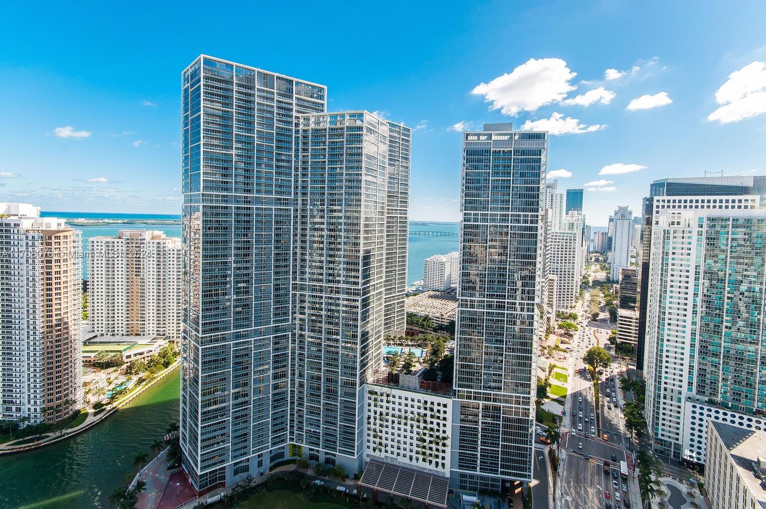 LUXURIOUSLY APPOINTED 2BEDROOM+DEN, 44TH STORIES ABOVE BRICKELL. BREATHTAKING WATER & CITY VIEWS WITH FLOOR TO CEILING GLASS EVERYWHERE. NO DETAIL HAS BEEN OVERLOOKED, CUSTOM UPGRADES INCLUDE: COUNTERS, DOORS, CLOSETS, BATHROOM VANITIES, MIRRORS, AND LIGH TING. EXTENDED KITCHEN COUNTERS CREATE AN UPSCALE DINNING AREA.COUPLED WITH THE BEST AMENITIES IN MIAMI,ICON BRICKELL IS WHERE YOU WANT TO BE!.