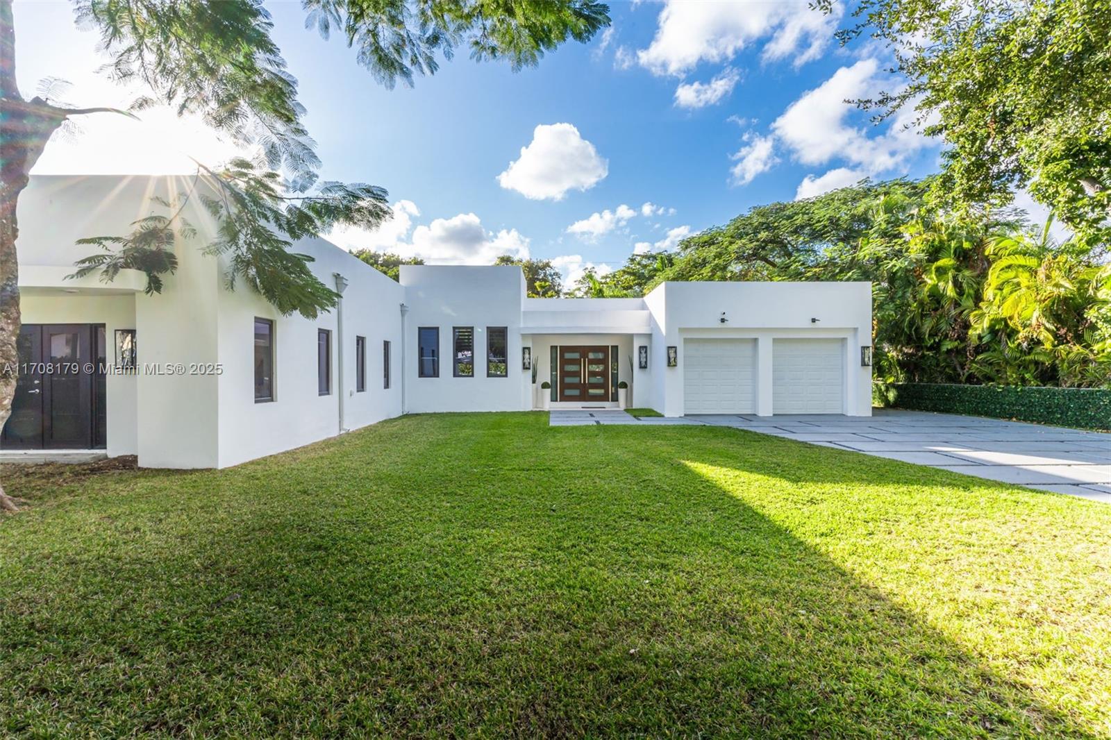 Introducing a Stunning Modern Luxury Home in Coral Gables. Discover a newly constructed and rebuilt architectural masterpiece, completed in 2022, in the prestigious Coral Gables. This completely gated modern luxury home features 4 bedrooms, 4 full bathrooms—including 3 en-suite—and 3,267 sqft of refined living space. Set on a rare 10,700 sqft double lot, this home offers unmatched space and privacy. Highlights include a gourmet chef’s kitchen with Bosch appliances, premium finishes, custom-built closets, and a lush outdoor area designed for entertaining. Located minutes from Miracle Mile, Coral Gables Country Club and the Biltmore Golf Course—this home combines timeless luxury with modern convenience. A true gem! Seller-held financing available. Schedule your private showing today!