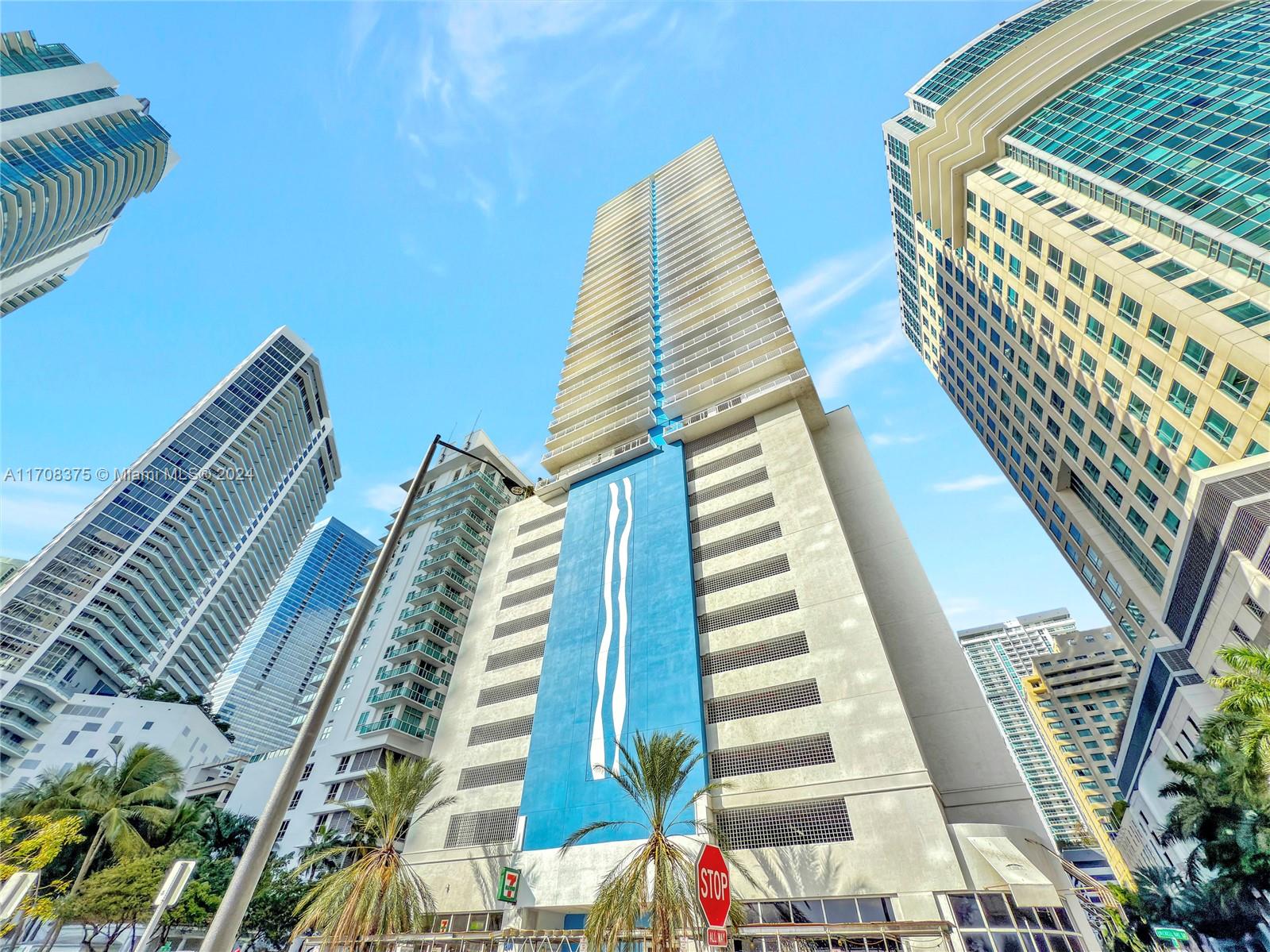 Amazing Brickell corner residence. Offers impressive city and ocean views from a wrap-around balcony.  Spacious 3 bedroom, 2 bath unit feels like a large, single family home in the sky. Amenities include available valet service, 2 Pools with Jacuzzi, Complete Gym with  Sauna, Gaming Room, Barbecue Area & Clubhouse Lounge. Next door to Miami's best restaurants & shopping. Minutes away from Miami Beach and airport. HOA includes Fiber Optic High Speed Internet, HD Cable and Water. Perfect cozy home for the active city family. Also a great investment property, due to NO restrictions on short term rentals. Tenant in place through February 2026.