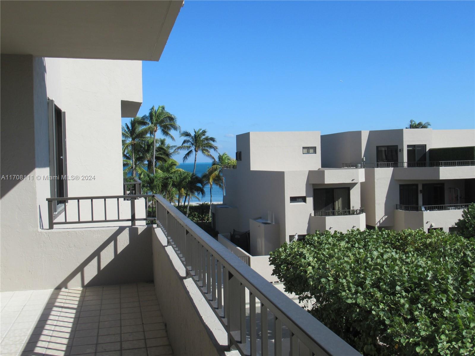 South side! Located 3 units back from ocean front slope. Tropical views to the Gardens, Pool areas & Ocean. Large Terrace! Tile floors throughout!