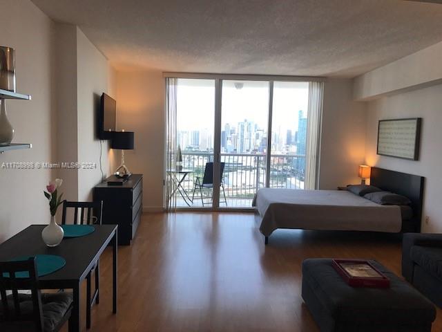 Beautiful and bright Studio on the 39th floor, fully furnished , with an amazing views looking at the bay, ocean and Downtown skyline. Wood laminate flooring, full bathroom, walk-in closet and balcony. The apartment is in the Opera Tower right in front of Margaret Pace Park, where you can run, play tennis, volleyball. 
Close to supermarkets, museums, restaurants and the Metro Mover Adriann Arsht Station.
Building has great amenities and an assigned covered parking, unfortunately the pool is actually under remodeling.
Available from 2025, January 1st, tenant occupied until 2024 December 28th.
Please Text the Agent to schedule a showing.