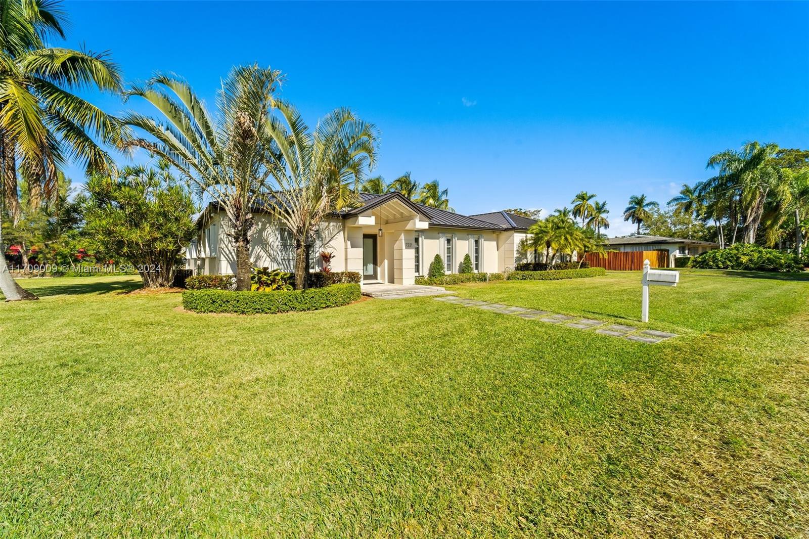 Welcome to 7221 SW 110 Terr, a stunning canal-front pool home nestled in the highly sought-after Village of Pinecrest. This beautifully updated residence features a spacious main bedroom with a cozy sitting area and a generous walk-in closet. Additionally, there are two more well-appointed bedrooms and a versatile office/den, perfect for work or relaxation. The home boasts spacious living areas filled with natural light, creating a warm and inviting atmosphere. A two-car garage offers ample storage and convenience. Enjoy serene water views, lush landscaping, and a private backyard oasis ideal for entertaining or unwinding. Experience comfort and elegance in this exceptional Pinecrest retreat.