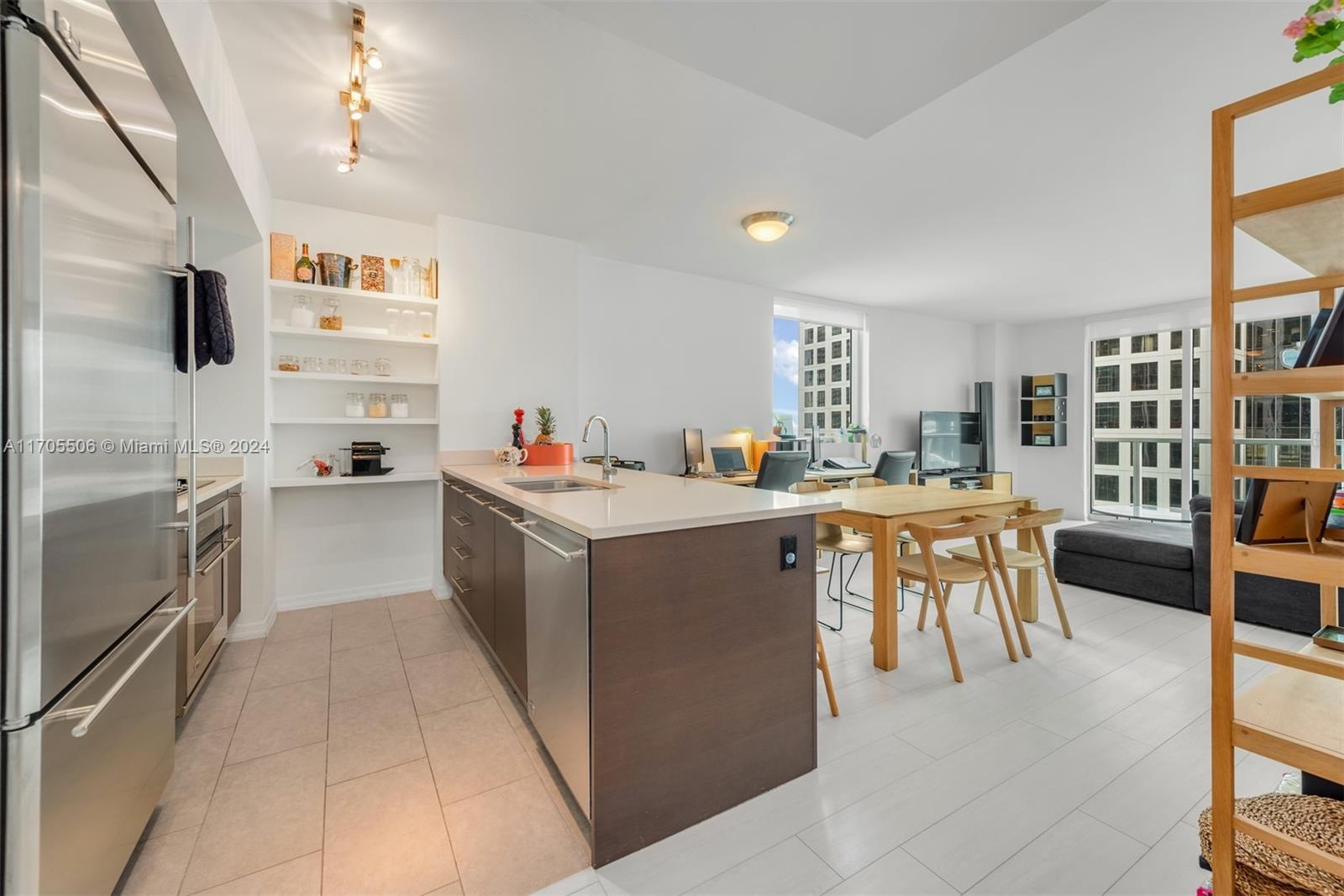 An exquisitely designed 2 Bed/2 Bath corner unit at 500 Brickell West w/ 1,200 interior sq ft, WPC vinyl flooring throughout main living areas, built-in closet cabinetry, roller shades on all windows, s/s kitchen appliances, kitchen pantry, kitchen island w/ Quartz countertop, Jacuzzi tub & separate glass-enclosed shower in master bathroom, walk-in closet in master bedroom, and floor-to-ceiling glass windows w/ views of the bay & river from the 26th floor. Includes one (1) assigned parking space. Building amenities include 42nd-floor rooftop pool & sundeck, 11th-floor infinity-edged pool and poolside cabanas, His & Hers sauna and steam room, hot tub, club rooms, concierge, 24-hr valet parking, fitness center & more.