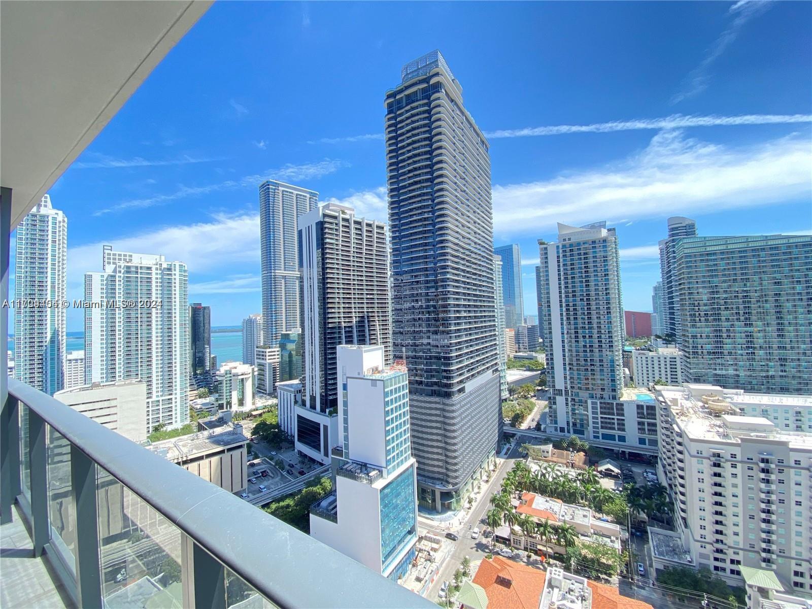 Experience luxury living in this 2-bedroom + den residence in the heart of Brickell. Featuring porcelain floors, floor-to-ceiling windows, and a wrap-around balcony with stunning city and bay views, this home offers modern elegance. Enjoy top-tier amenities, including a rooftop pool, Equinox gym, SoulCycle studio, concierge, valet, and more. Just steps from Brickell City Centre, restaurants, and nightlife, this residence combines style, convenience, and unbeatable views.