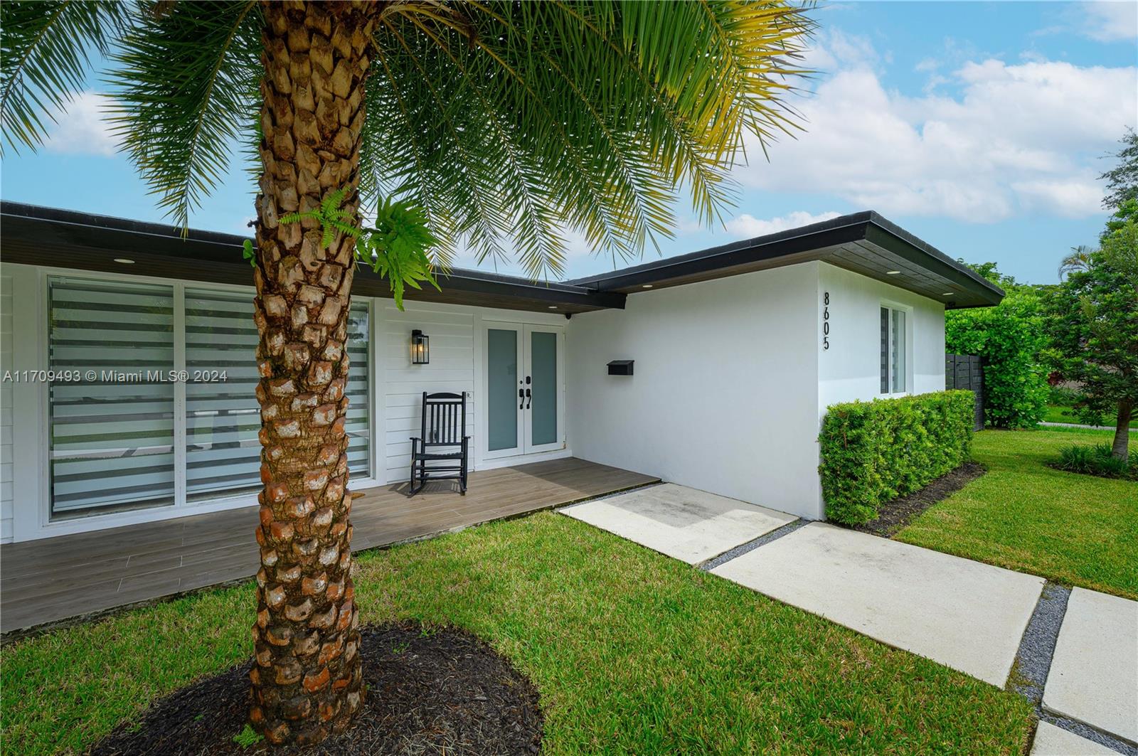 Remodeled in 2023, this home was expanded by 500 sq. ft., adding a new master bedroom, master bath, and a Jack and Jill bathroom, transforming it into a spacious 4-bedroom, 3-bath property. The renovation includes new plumbing, electrical systems, and AC units with a split system for enhanced comfort. The home features a new roof, 3/4 fireproof drywall, and upgraded insulation in the walls and roof. Solid wood interior doors and dual water heaters add to the premium upgrades. The air-conditioned laundry room provides extra convenience. The open kitchen layout includes a separate bar and Jenn Air panel-ready appliances for a sleek design. The property also includes a beautiful pool, perfect for relaxation and outdoor entertaining.