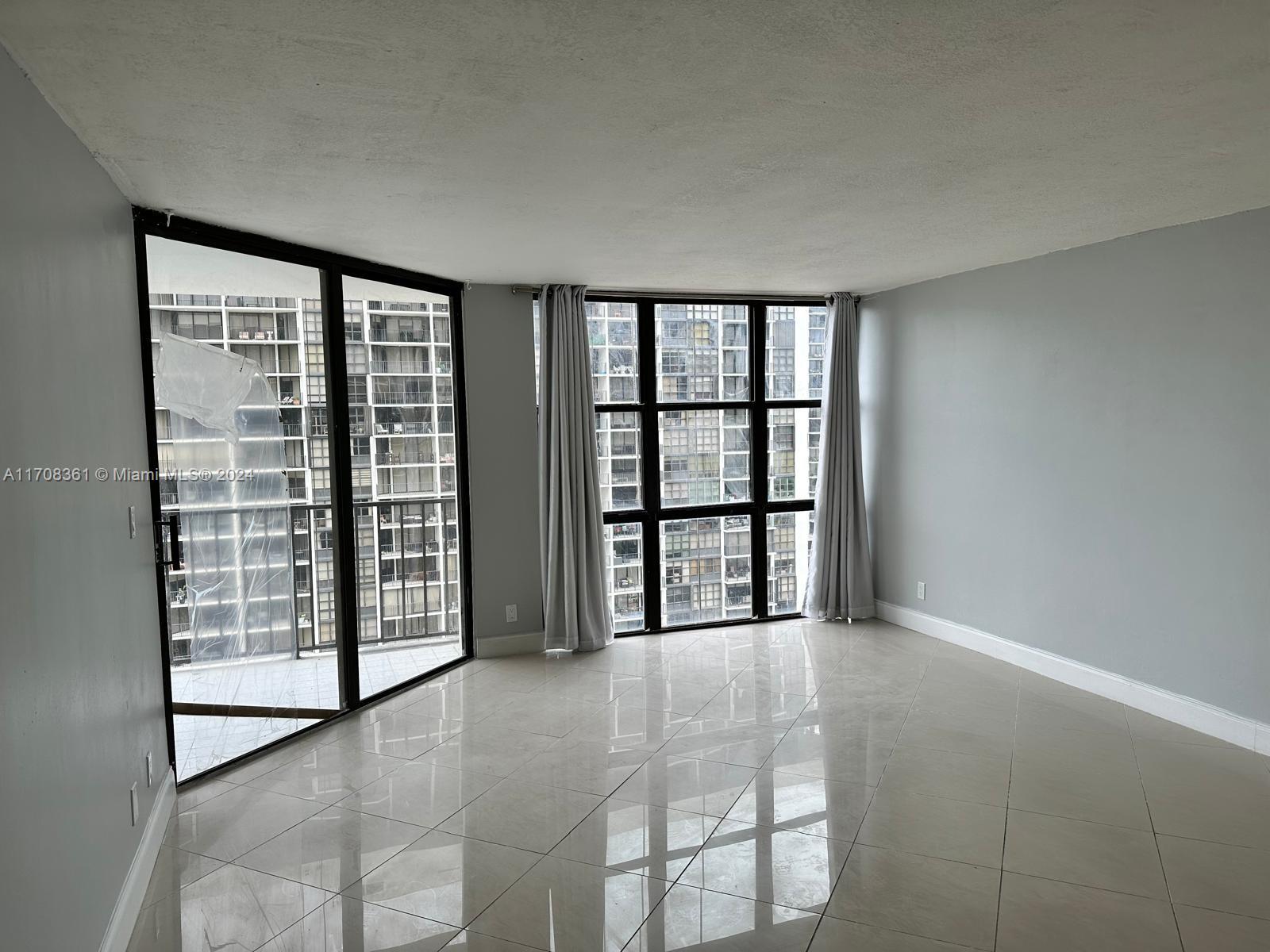 Experience luxurious living at Brickell Place with this captivating 1-bedroom, 1.5-bathroom condo. L This very spacious unit offers stunning  partial water views and is move-in ready with new impact windows, doors, appliances, and flooring. Nestled on a charming tree-lined street in Brickell, it boasts top-notch amenities at a low maintenance fee. Enjoy two heated pools, six tennis courts, a renovated gym, racquetball court, BBQ area, private marina, party room, convenience store, valet parking, and scenic walkways. With easy access to I-95, explore Miami's vibrant cityscape. This residence provides the ultimate Miami lifestyle, combining comfort, leisure, and convenience for an unparalleled living experience. Easy to show please see broker remarks