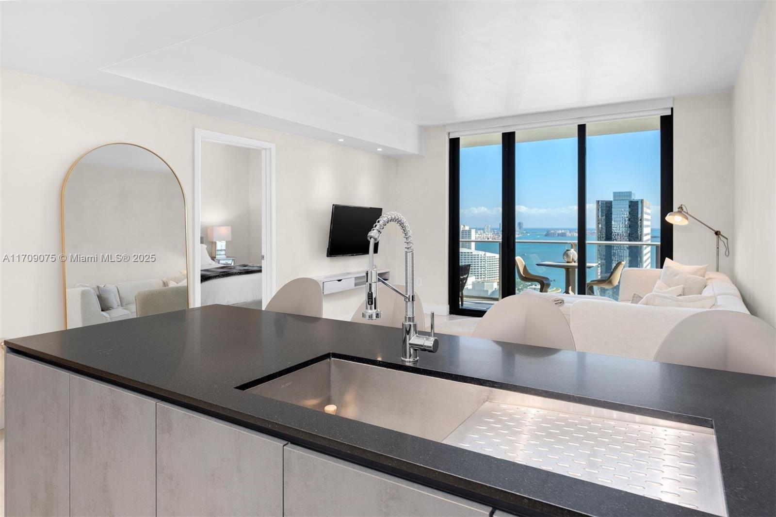 This stunning 2-bedroom plus den, 3-bathroom residence in Brickell features direct elevator access for unmatched privacy and convenience. Located in one of the area’s most sought-after buildings, the unit offers breathtaking Biscayne Bay views.

The bright, spacious layout boasts floor-to-ceiling windows, a sleek kitchen with premium appliances, and ample storage. Both bedrooms feature en-suite bathrooms, and a versatile den adds flexibility for a home office or guest space.

Amenities include a rooftop pool, indoor pool, fitness center, spa, and children’s play area. Situated in the vibrant Brickell neighborhood, you’re steps from world-class dining, shopping, and entertainment.