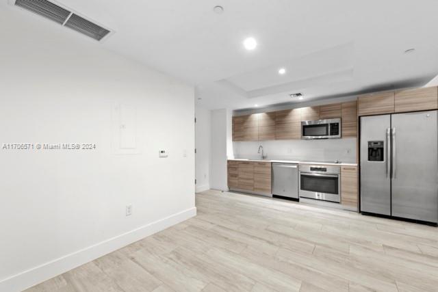121 NE 34th St #L303, Miami FL 33137