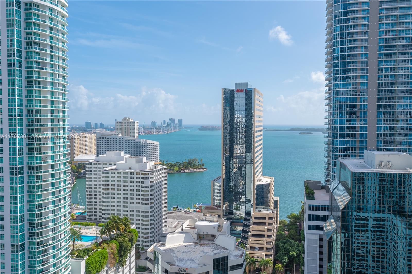 This architectural masterpiece offers a blend of luxury and modern sophistication. Perched on the 29th floor, the private elevator delivers direct access to a stunning 2-bed + Den, 3-bath home. The expansive floor-to-ceiling glass walls showcase panoramic views of Biscayne Bay & Miami skyline, complemented by a spacious balcony for outdoor living. The interior features high-end finishes, including Italian porcelain flooring throughout & European kitchen. The unique amenities include an indoor heated pool with retractable glass walls that open to the outdoor pool and Jacuzzi, a sun deck, and a rooftop terrace. The Club at 1010 offers a 2-story spa with a Hammam Turkish steam bath, a state-of-the-art fitness center and a running track, ensuring a lifestyle of ultimate comfort & convenience