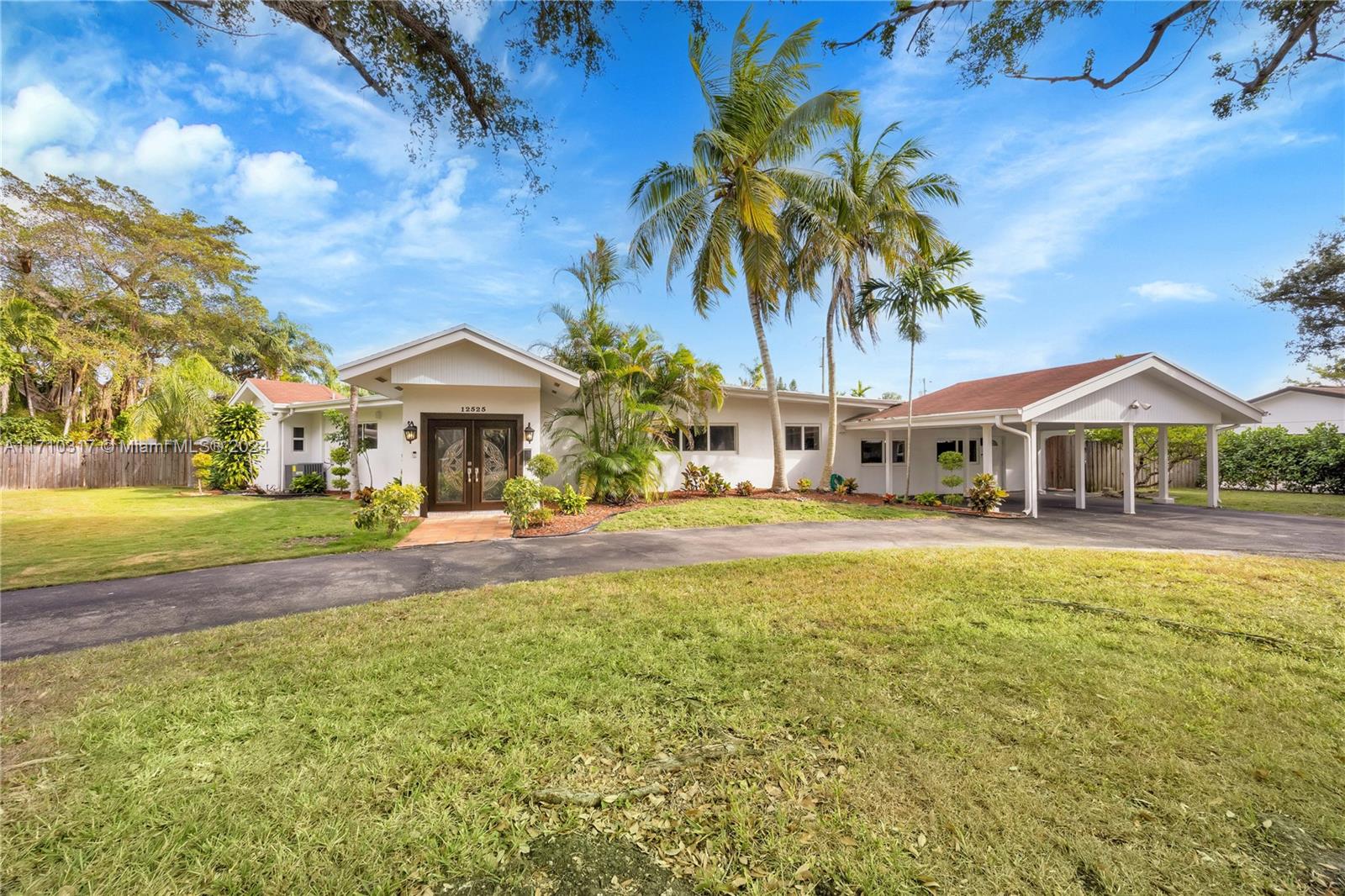 Experience the ultimate in luxury living with this exceptional rental home in Pinecrest, FL, located in the highly regarded Palmetto school district. This 5-bedroom, 4-bathroom residence offers style and comfort on a spacious half-acre lot. Impact windows and doors provide peace of mind, while the circular driveway and carport offer ample parking. Enjoy a sparkling pool for relaxation and entertaining in your private outdoor oasis. Combining elegance with practicality, this Pinecrest rental is an opportunity you won’t want to miss! Freshly painted, new flooring throughout, 2 new a/c’s, and much more!