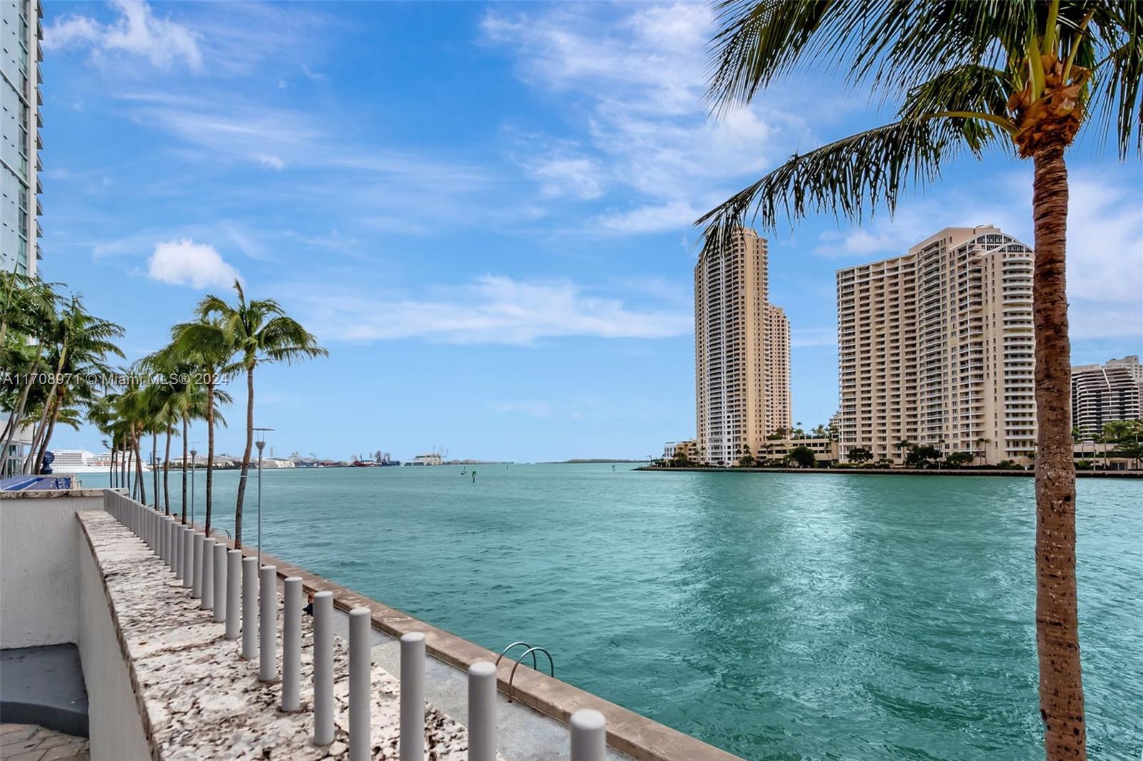 26th-floor corner apartment with beautiful views of Biscayne Bay, the Port of Miami, and the city skyline. The living room and second bedroom feature floor-to-ceiling windows, filling the space with natural light. The main bedroom offers a peaceful view of the bay and port. The unit includes an open layout, a private balcony, a functional kitchen, and plenty of cabinet storage. Amenities include bike storage, a billiard room, a business center, a clubhouse, a community room, an elevator, an exercise room, a heated pool, a regular pool, a sauna, and a spa/hot tub. Conveniently located near shopping, dining, and entertainment options.