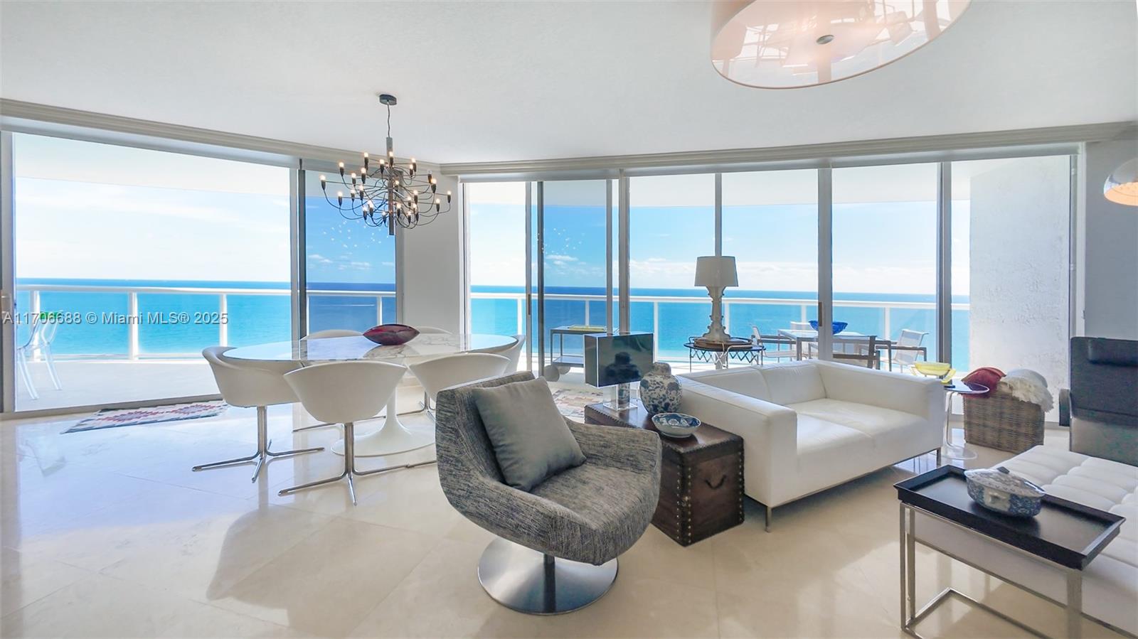 Spectacular view from the 31st floor, 3 beds + den, 3.5 baths unit with panoramic views of the ocean and intracoastal / 2,230 sq. ft of living area / The den can be used as an additional bedroom / Private elevator takes you directly into your foyer / Marble floors through out the apartment / Built in closets / 2 assigned parking spaces / Building features: fully renovated lobby, heated pool, Jacuzzi, two story gym, sauna, tennis court, beach service, party room, business center, and much more!