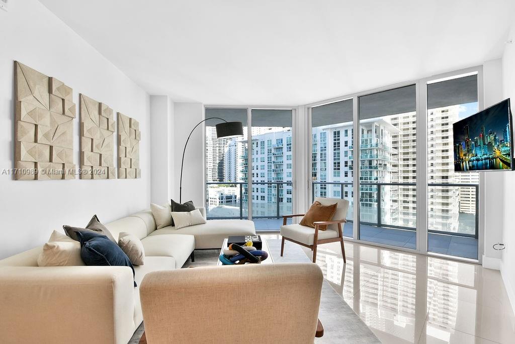 Completely move-in ready 2 bed, 2 bathrooms on high rise floor at Brickell House. This corner unit has breathtaking water views of the Biscayne Bay from nearly every room and enjoys abundant light coming through its floor to ceiling glass windows. The unit comes equipped with brand new porcelain floors, upgraded high-end finishes, spacious closet space, and newly acquired modern designer furniture. Live the lifestyle and enjoy on-site 24-hour concierge with valet, 7-days a week, a fully equipped fitness center with spa and 2 steam rooms, a children’s playroom, 2 full lap 50-ft pools including one in the 46th floor Sky deck with panoramic views, and so much more to enjoy the Brickell living at its very best in this luxurious resort-style community.