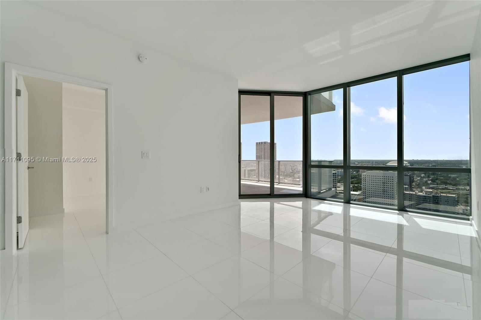 This highly desirable 2-bedroom + DEN (convertible to a 3rd bedroom) unit on the 43rd floor of Paramount Miami World Center offers stunning city views and luxurious finishes. Features include 10' ceilings, floor-to-ceiling windows, white porcelain floors, and an Italian kitchen with premium appliances.

Building amenities include a fitness center, boxing studio, spa, infinity pools, sports courts, billiard room, yoga studio, game room, BBQ area, kids play area, and more. Walk to the Perez Art Museum, American Airlines Arena, Bayside Marketplace, dining, and nightlife, with easy access to I-95 and Miami International Airport.