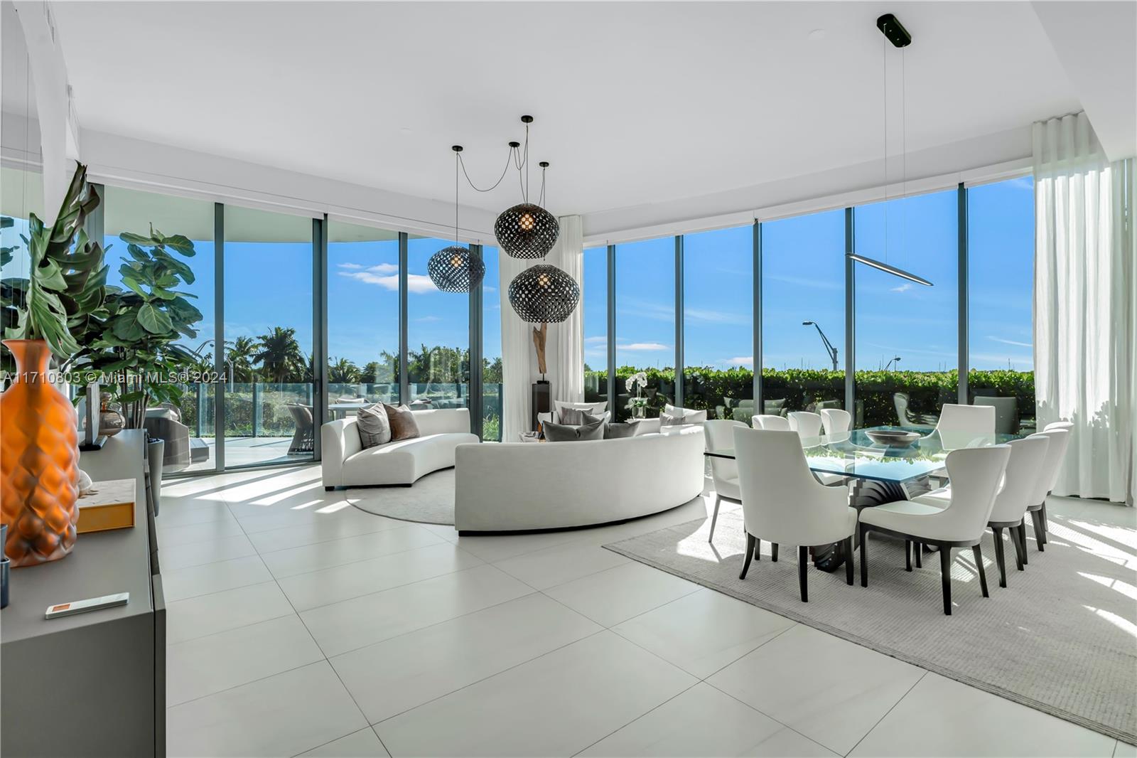 Magnificent 4 Bedroom + Den corner residence at One Park Grove, Coconut Grove's premier building by Rem Koolhaas.  This rarely available, water-facing "A-Line" features a private Elevator Landing, 12 ft. ceilings and floor-to-ceiling glass.  The William Sofield designed Chef's Kitchen with Wolf, Miele, and Sub-Zero appliances features a Gas Range and island.  Enjoy marble floors, high-end finishes, spacious Living Area and large Primary Suite which both flow out to the nearly 30-ft long Terrace surrounded by lush private gardens offering the utmost in privacy.  The Primary Suite features custom built-in closets, double vanities, and separate toilets. All bedrooms en-suite.  Amenities include a Rooftop Pool, Spa, Gym, Restaurant, and 5 acres of tastefully inspired grounds by Enzo Enea.