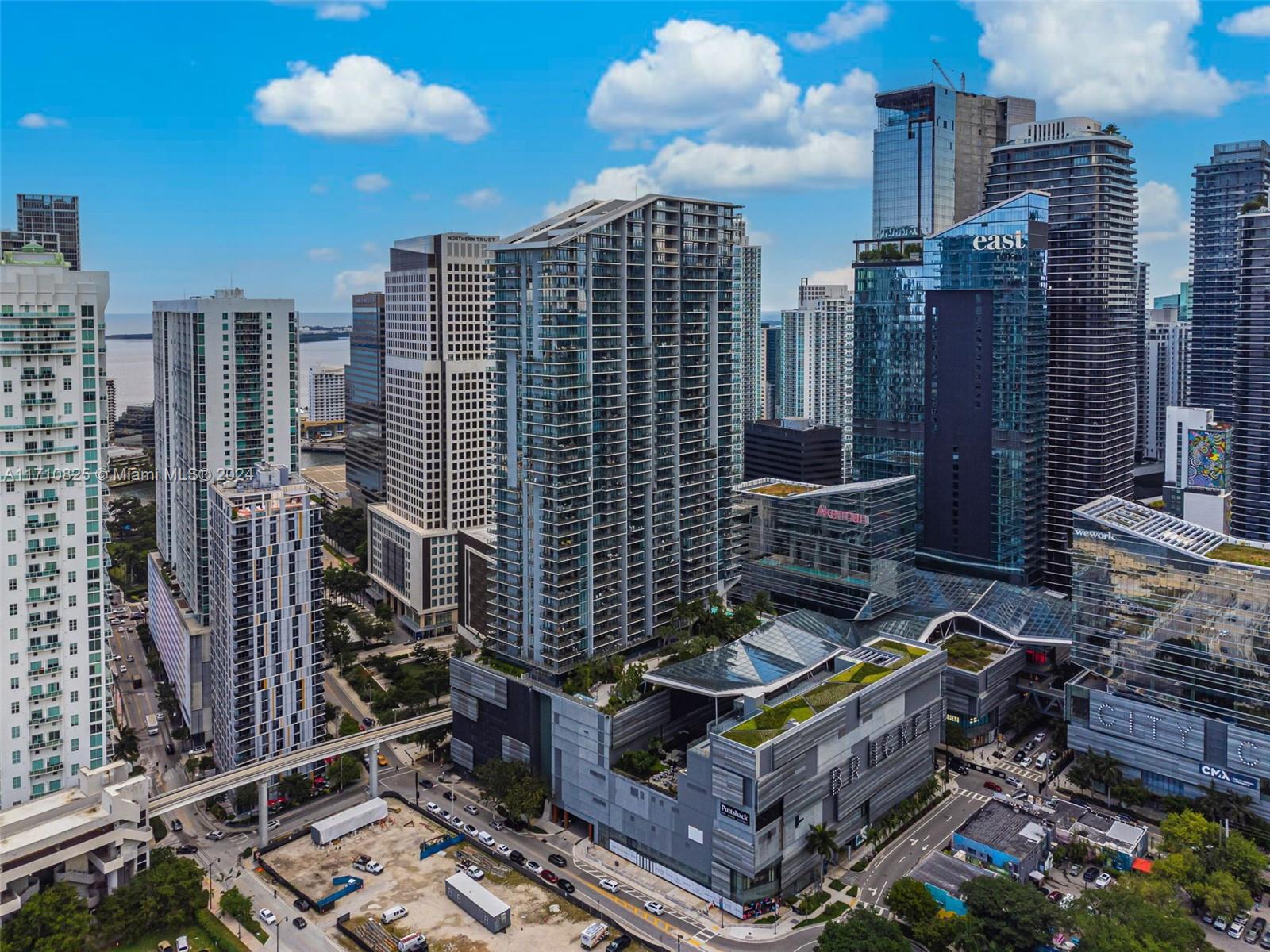 Introducing the Pinnacle of Luxury Living: Perched on the 28th floor, this exquisite condominium offers an unmatched living experience with panoramic city and bay views. Spanning 1,891 sq. ft., this expansive residence features 3 bedrooms, a den, 3 full bathrooms, and an elegant half-bath. Floor-to-ceiling windows bathe the interiors in natural light, while the spacious balcony invites you to savor your private oasis in the sky. Nestled in the heart of Brickell City Centre, indulge in exclusive shops, fine dining, and world-class amenities. Reach elevates luxury living with 24-hour security, valet service, a state-of-the-art fitness center, a full-service spa, and two stunning pools. This is where sophistication and comfort meet.