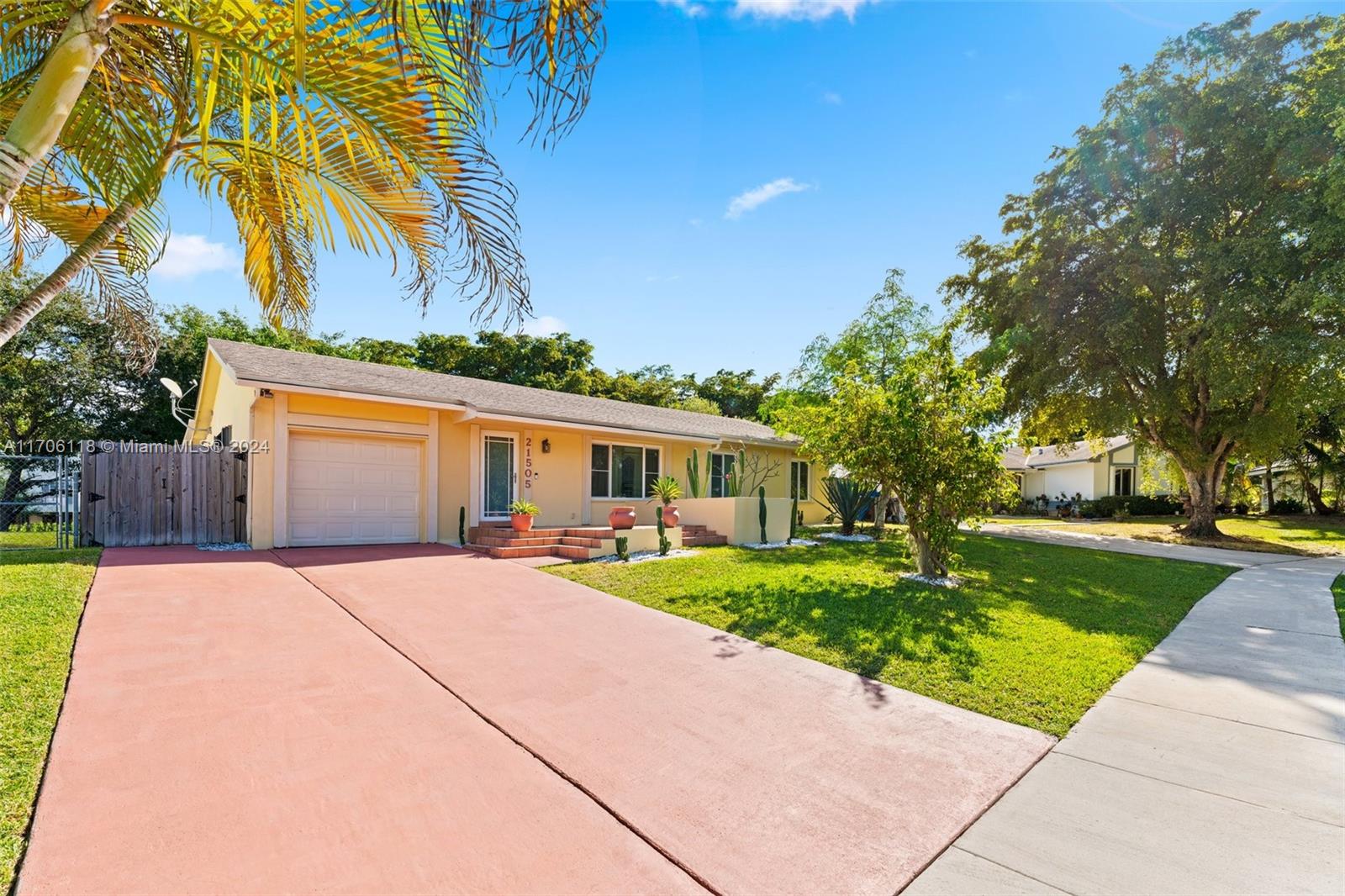 Charming family home in the highly sought-after community of Cutler Bay, just minutes from Black Point Park, Marina, and convenient access to the Turnpike. This spacious one-story residence offers five bedrooms and three bathrooms, including a private in-law suite with its own entrance. The oversized primary bedroom boasts ample space for a home office or cozy sitting area. Designed for both comfort and style, the home features high ceilings, an open layout perfect for gatherings, and a beautifully remodeled kitchen with granite countertops. Enjoy peace of mind with a newer roof and impact-resistant windows and doors. A perfect blend of space, function, and location—this home is a must-see! Seller is offering buyer closing cost credits.