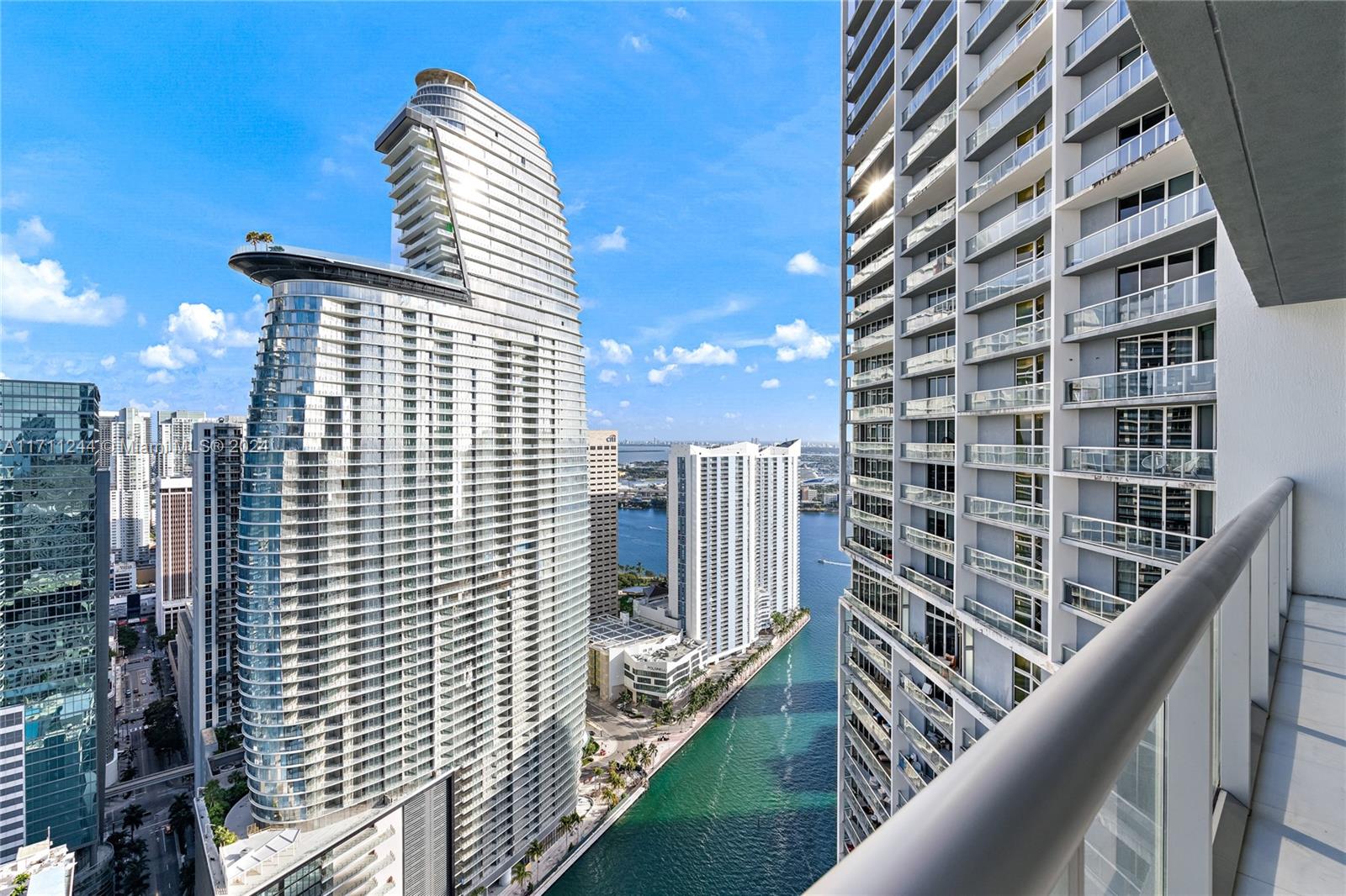 Fully furnished 1-bed, 1-bath condo with spectacular high-floor views. Enjoy Miami skyline, Miami River, and Biscayne Bay vistas in Brickell's premier luxury building. The unit is freshly painted floor-to-ceiling impact windows, Italian kitchen, and top-tier Bosch, NEW Wolf stove-top, NEW dishwasher and Subzero appliances. The bedroom includes blackout shades and a walk-in closet. Rent covers Internet, cable (2 TVs), water, and parking. Five-star amenities like a spa, fitness center, and Olympic-sized infinity pool. Fine dining nearby with proximity to Brickell City Center, Mary Brickell Village, Whole Foods, and Bayfront Park. Move-in ready, fully furnished – perfect for out-of-state renters. Minimum 1-year lease required.