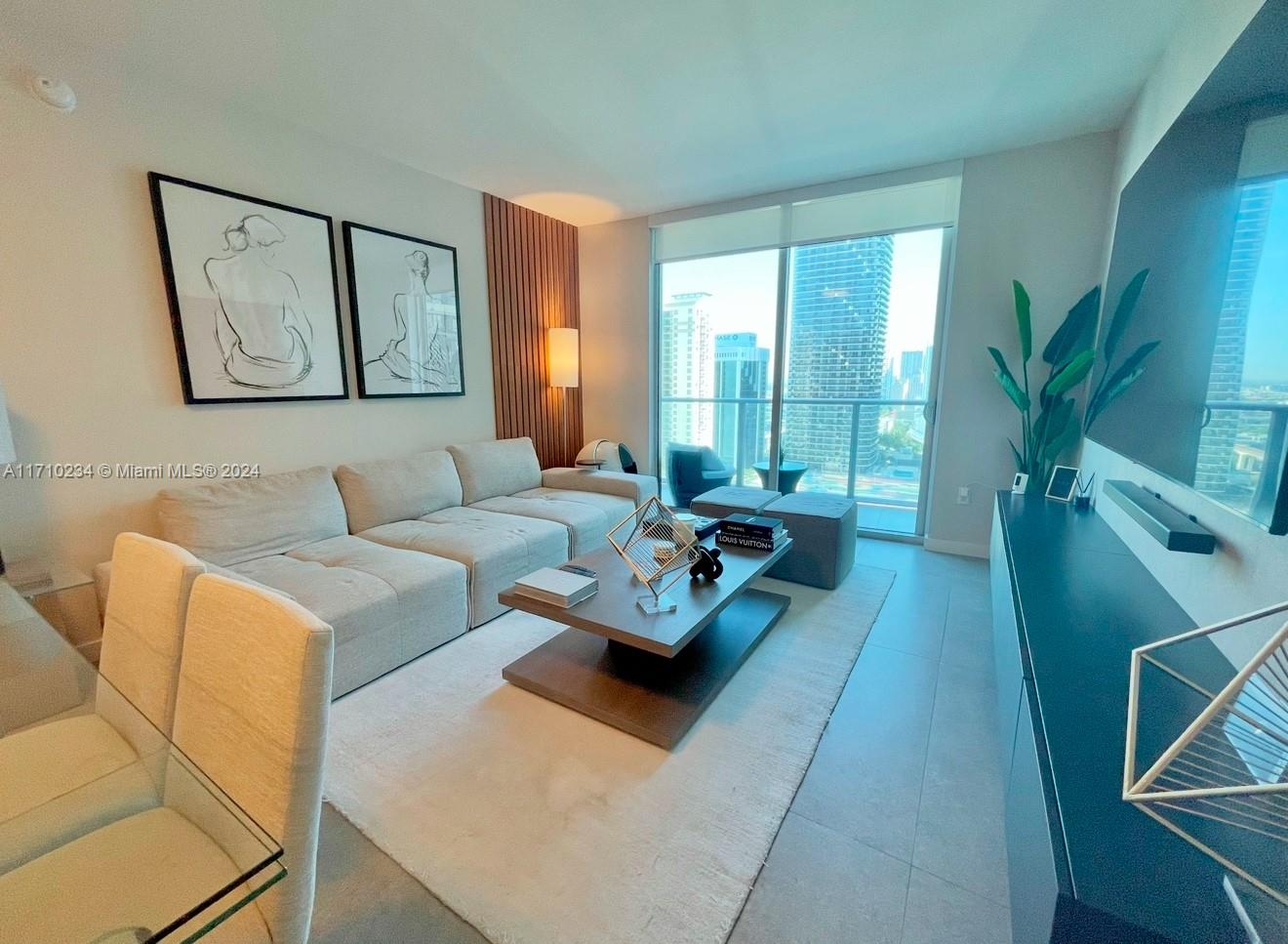 Beautiful modern 2 bedroom/ 2 bathroom. FULLY FURNISHED! New kitchen countertops with floor to ceiling quartz, including waterfall island, new countertops in bathrooms, custom closets, floor to ceiling custom mirror & luxury wall paper through out, including bathrooms. Absolutely luxury living. Enjoy walking distance to restaurants and shops, including the Mary Brickell Village and the Brickell City Centre. Available after 12/21/24.