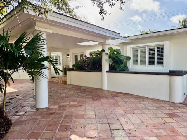 Newly remodeled one-story home centrally located on a quiet, tree lined street in Coral Gables. This bright and beautiful home offers 4 spacious bedrooms and 3 full bathrooms. The expansive living area connects to a formal dining room, adjacent to a kitchen equipped with stainless-steel appliances. Step outside to the private walled-in backyard, a tropical paradise, with a gorgeous pool that is perfect for entertaining. The large master suite features an oversized bathroom with hot tub, walk-in closet, bonus office or sitting area, and direct access to the pool. It boasts a large family room, Florida room, one car garage, covered car port, and circular driveway with plenty of parking. Pool, waste, and lawn maintenance included in rent. Pets are welcome. Available now.