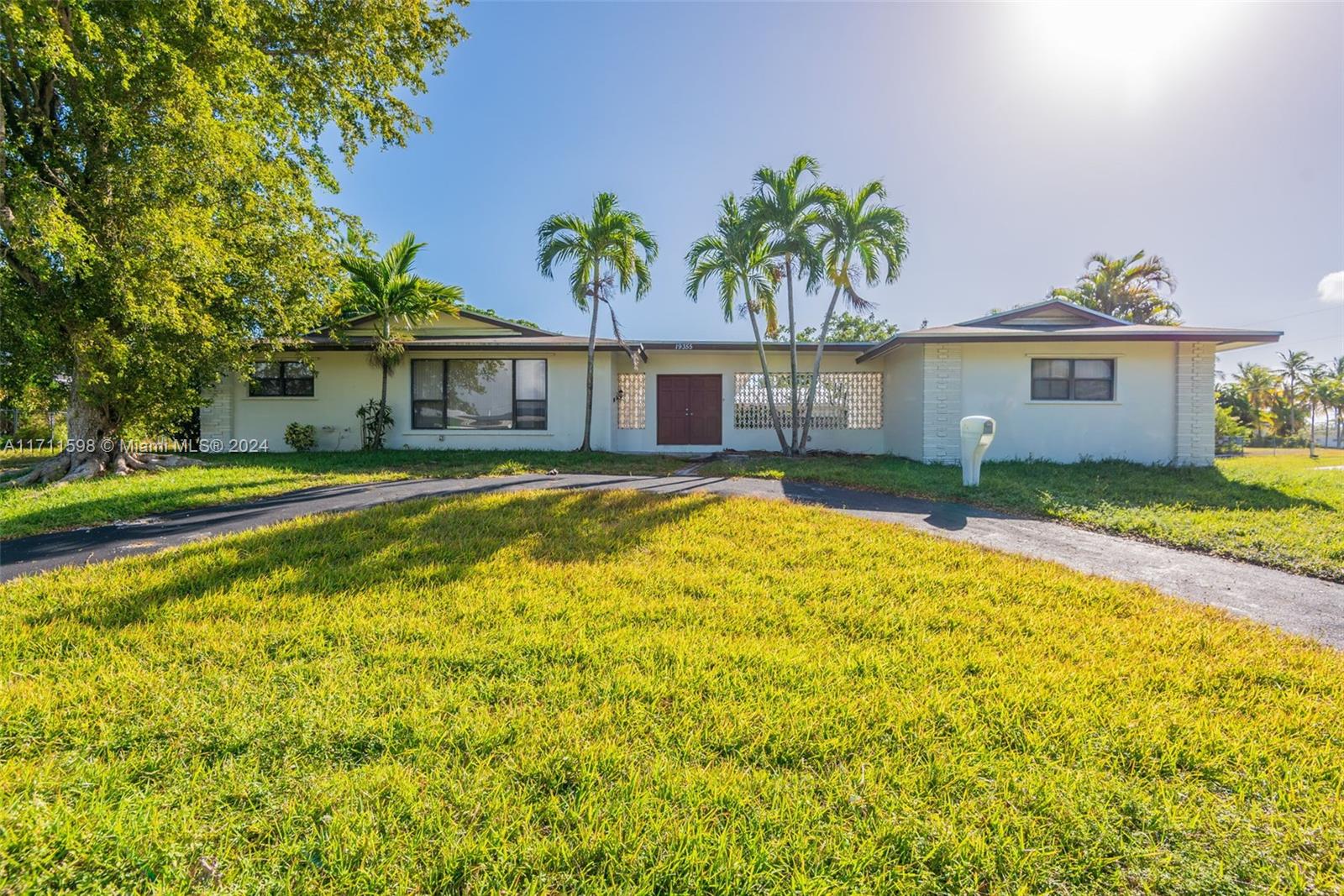 Welcome to 19355 SW 88th Court, a beautifully maintained 3-bedroom, 2-bathroom home nestled in the heart of Cutler Bay, Florida. This spacious residence offers a welcoming atmosphere with over 1,600 square feet of living space, perfect for entertainers. The open-concept layout features a bright living room, formal dining area, and a well-equipped kitchen with modern appliances. The primary suite includes an ensuite bathroom, providing a private retreat. Outside, the backyard is a private oasis with lush landscaping that just needs your green thumb, ideal for relaxing or hosting gatherings. Located just minutes from local schools, shopping centers, and parks, this home offers both comfort and convenience. Don’t miss out on the opportunity to make this home yours!