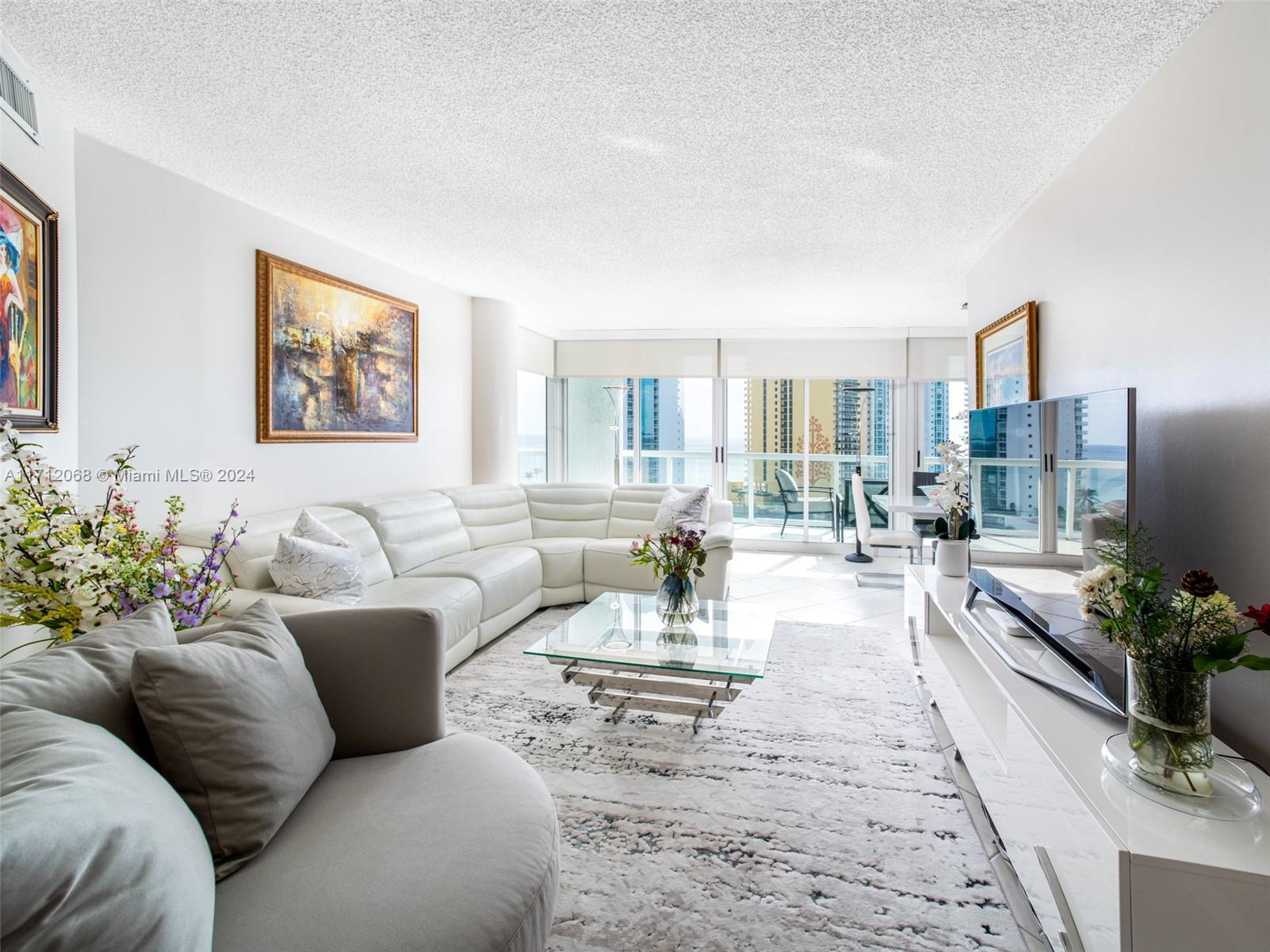 Fabulous opportunity to reside in majestic Sunny Isles Beach. Exquisite 2/2 plus den offers abundant natural light and sweeping SE views of both the Atlantic Ocean and Intracoastal Waterway. Floor-to-ceiling windows and private balconies in every room create seamless indoor-outdoor living. Spacious design offers separate living and dining areas, perfect for both relaxation and entertaining. Gourmet kitchen features new s/s appliances. Oversized primary suite offers a walk-in closet and spa-like bath for ultimate indulgence. Oceania IV provides world-class lifestyle with premier amenities including private beach access, beach club, health spa, marina, dining, fitness facilities, tennis, and more. Guard-gated security, concierge, and valet add convenience. Also available for lease.