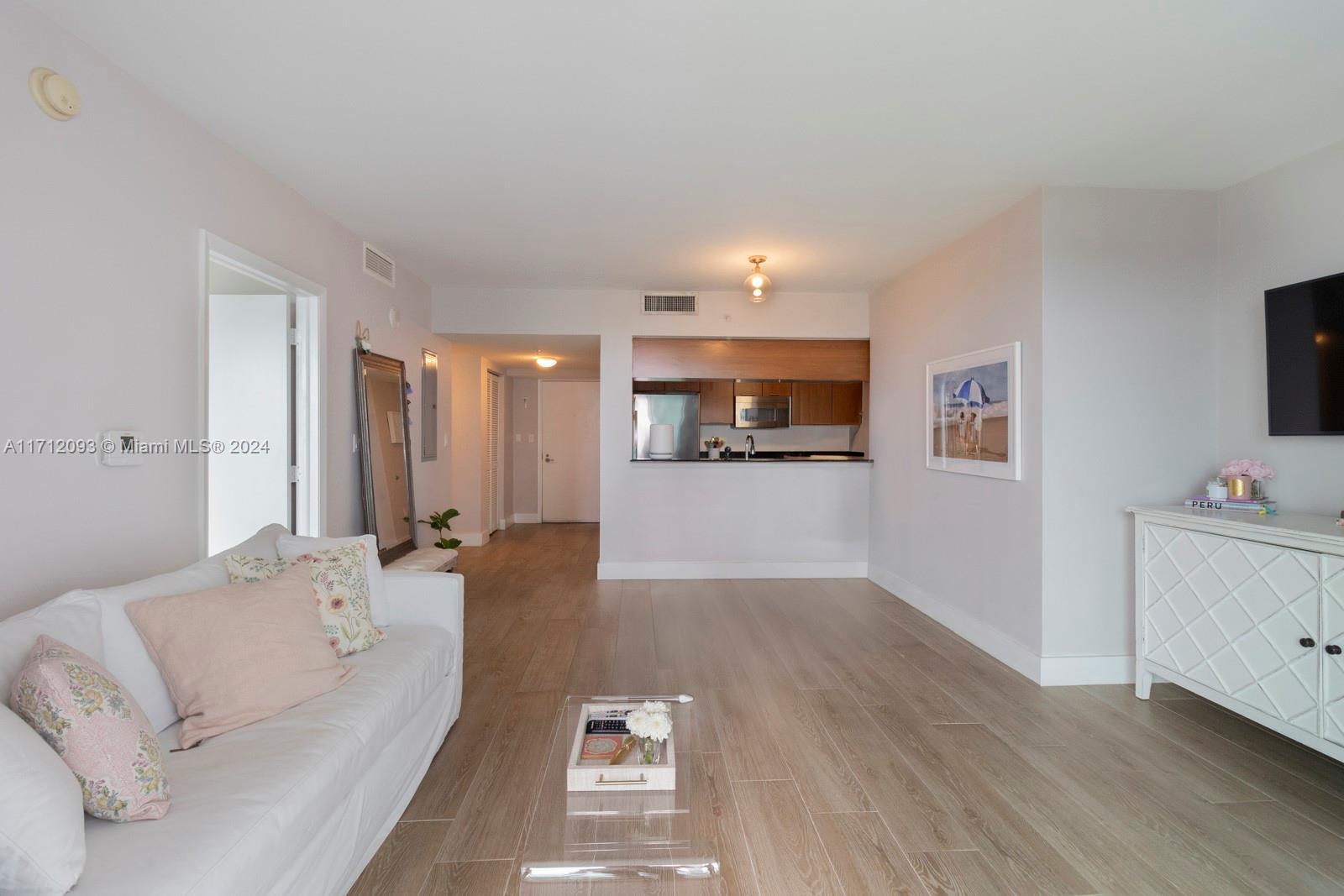 This 1-bed, 1-bath at The 1800 Club is centrally located in Miami’s vibrant Edgewater neighborhood. The unit spans 841 sqft has updated porcelain floors and a west-facing balcony with views of the sunset, pool, and city skyline. The unit features impact windows, walk in closet, and an open kitchen that flows into the dining & family areas. Residents enjoy the waterfront Margaret Pace Park, which offers basketball & volleyball, as well as expansive green spaces for outdoor activities. Additionally, the condominium provides resort-style amenities, including a gym, hot tub, and more. Ideally located minutes from Midtown, Wynwood, the Design District, Miami Beach, and Brickell, the 1800 Club puts Miami’s finest dining, shopping, and cultural destinations right at your doorstep.