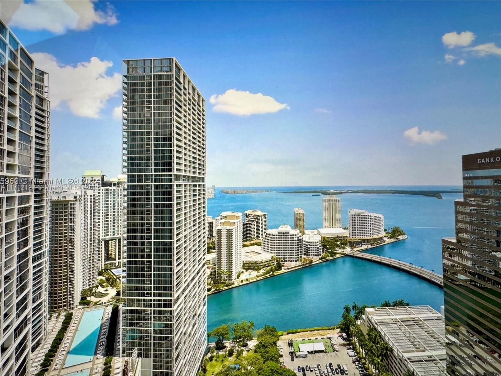 Spectacular bay and city views from this spacious 1 bedroom and 1 bathroom unit located in exclusive 500 Brickell (East Tower). Enjoy the unique amenities: 3 Spectacular pools including a lab pool and 42nd floor with panoramic view pool. State of the art fitness center, wine cellar room, sport bar room, his/hers hot jacuzzi, unique theater, walking distance of Brickell City Centre, Mary Brickell Village, the financial district, restaurants and entertainment. Quick access to main roads and expressways. Basic cable & internet included. New A/C and LG Washer and Dryer.