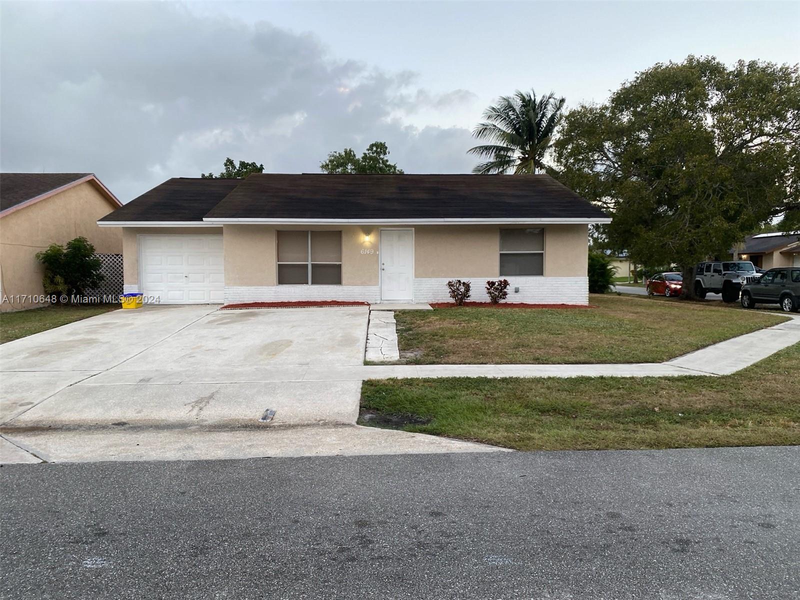 6149 Blue Grass Cir, Lake Worth, Florida image 1