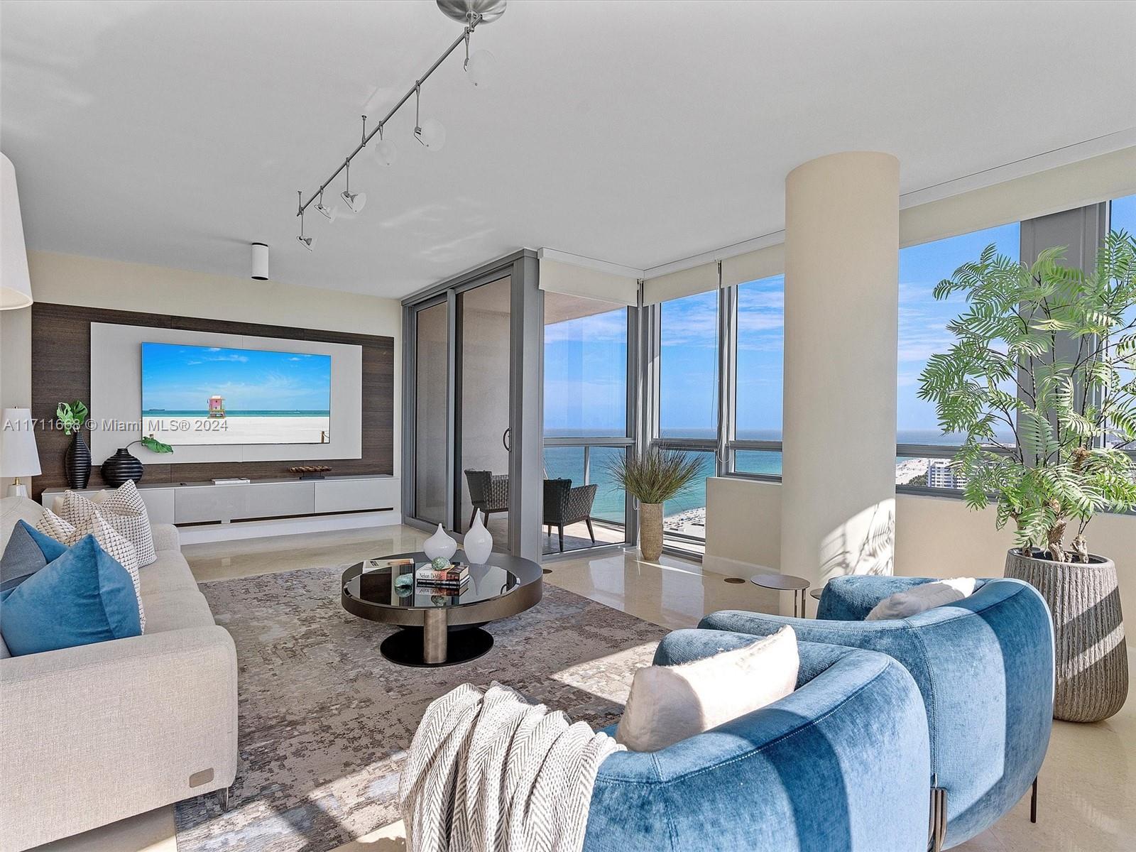 Located on the 30th floor of the prestigious Setai Miami Beach, this luxurious 2-bedroom ocean view condo offers an unparalleled living experience. With 1,209 sf, it features direct ocean views from all bedrooms through floor-to-ceiling windows. The master suite includes a king bed, spa jetted tub, and glass door walk-in shower, while the second bedroom has a queen bed and fully stocked closet. The kitchen is equipped with top-of-the-line appliances. Guests have access to the Setai's amenities, including three beachfront pools, a lavish spa, upscale restaurant, and 24-hour concierge. Additional amenities include valet parking, a gym, and beach service. This condo combines home comforts with the luxury of a 5-star resort. Short term rentals available through Five Star Luxury Travel.