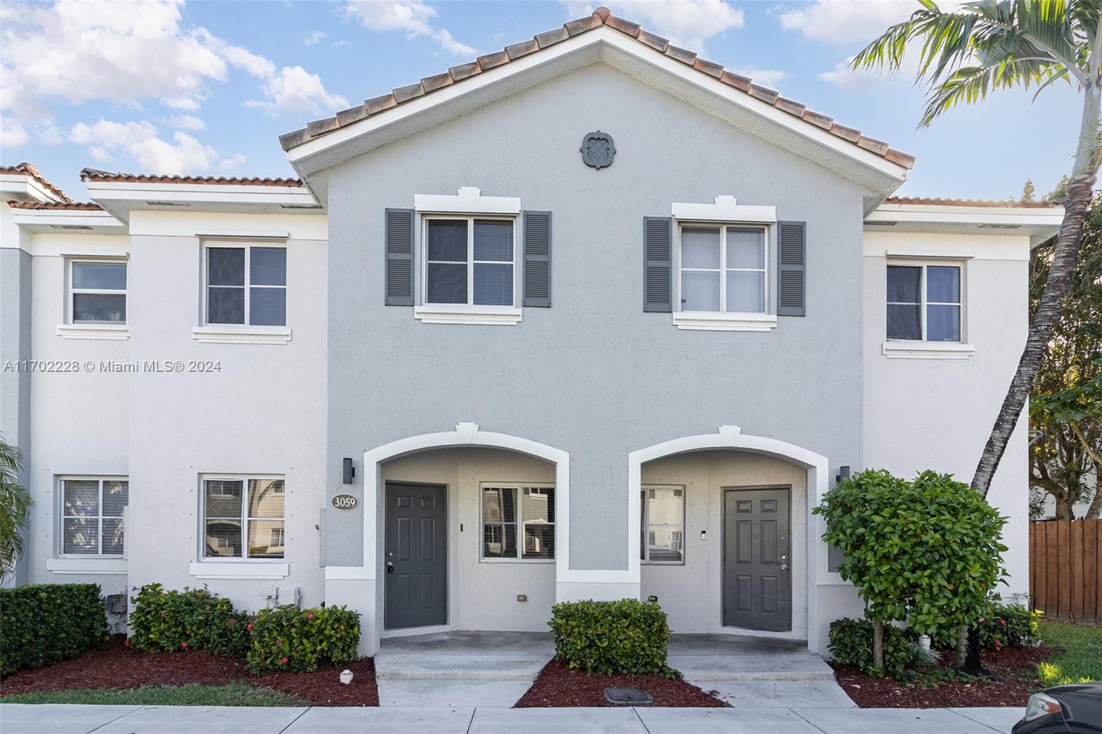 This stylish 3-bedroom, 2.5-bath townhome features hardwood-like floors and tile in the common areas. The kitchen is equipped with stone countertops and white appliances, offering both functionality and elegance. A convenient half bath is located downstairs, and the home boasts a serene lake view, perfect for relaxation and enjoyment.