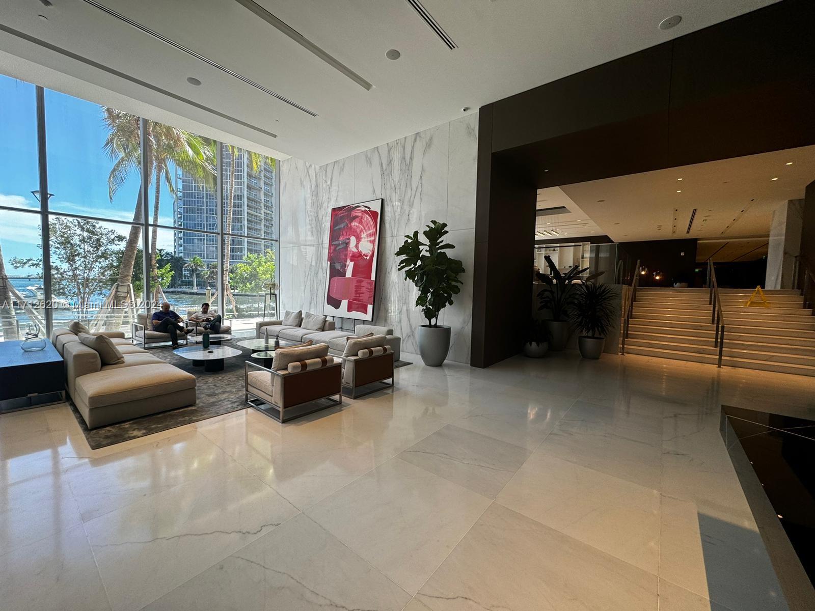 Step into luxury in this exquisite 1-bedroom, 1.5-bath residence on the 18 floor of the brand-new Aston Martin Residences. With breathtaking south-facing views of the bay, Brickell Key, and the ocean, this stunning home features elegant Thassos marble floors and a high-end Bulthaup kitchen equipped with top-notch Gaggenau appliances. Enjoy a spacious living area that opens to a beautiful terrace, perfect for relaxing or entertaining. The master suite offers a lavish en-suite bath and generous walk-in closets for ample storage. Residents can access over 42,000 square feet of world-class amenities including a state-of-the-art fitness center, soothing spa, and luxurious pools. Experience the pinnacle of Miami living.