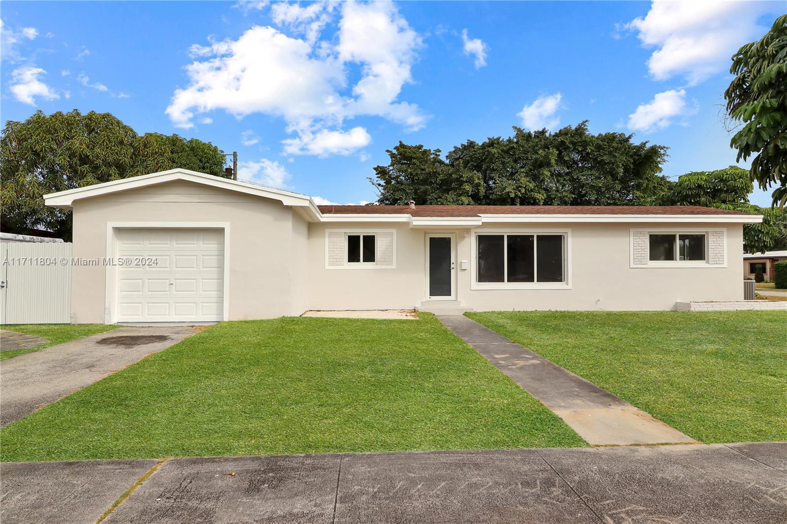 Updated 4-bedroom, 2-bath home in desirable Cutler Bay! This stunning corner-lot property offers the perfect blend of modern updates and spacious living.  Step inside to discover a new kitchen, updated bathrooms, and stylish new flooring. Impact windows and doors provide peace of mind and energy efficiency.  The open-concept layout is ideal for entertaining and family living, flowing seamlessly from the living area to the dining space and kitchen.  With a large backyard, you'll have plenty of room to create your private oasis – imagine a sparkling pool, lush garden, or outdoor entertainment area! Don't miss this incredible opportunity to own a move-in-ready home with endless possibilities!