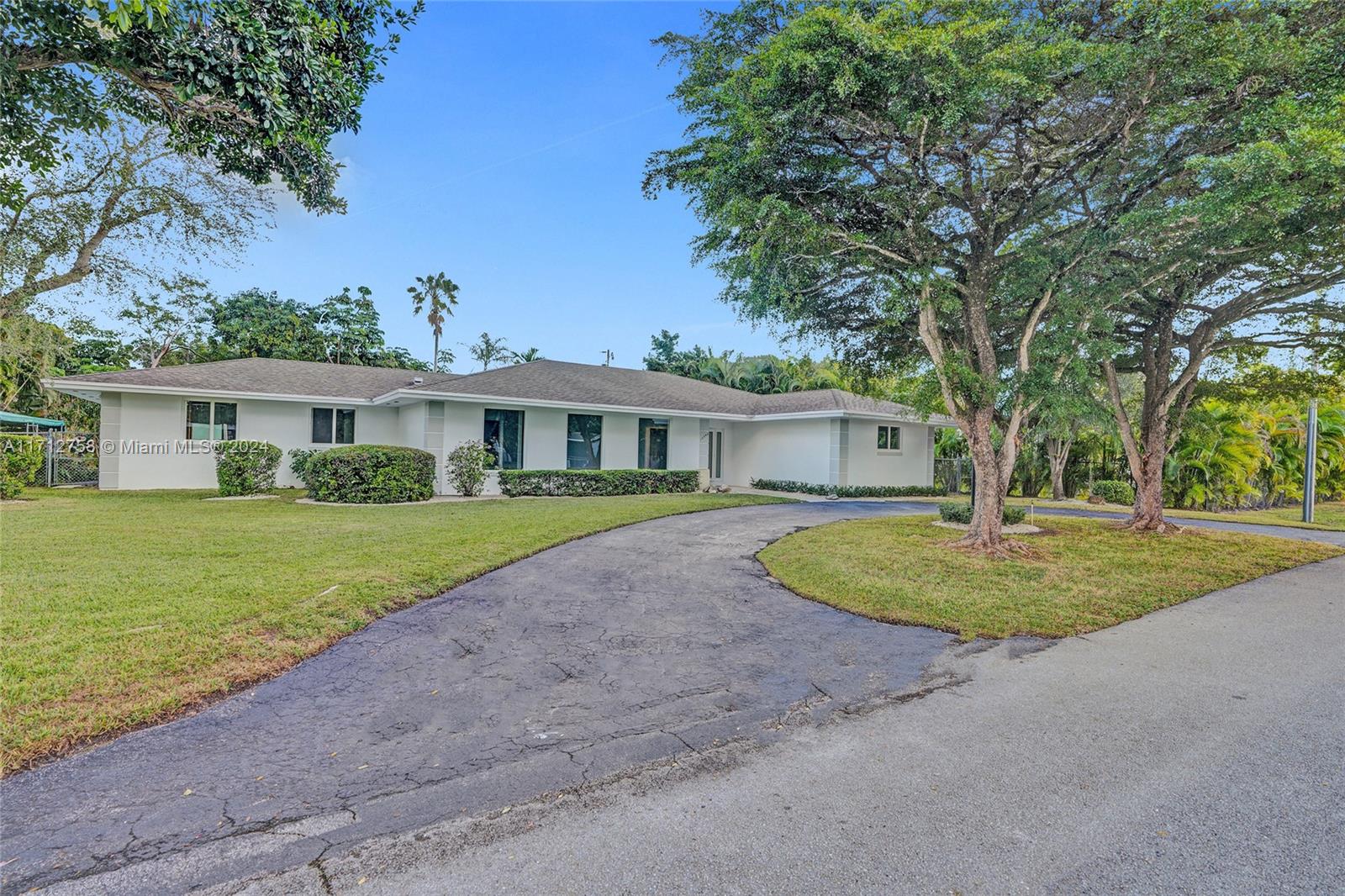 Beautifully renovated 4-bedroom, 2-bathroom home in the heart of Palmetto Bay! This stunning property features brand-new impact windows, modern flooring, and tastefully updated bathrooms. The spacious kitchen is perfect for entertaining, and the screened-in underground pool offers a private oasis. Nestled in a prime location, this home is close to top-rated schools, parks, and shopping. 2 car garage provides you with plenty of space to store items or park your cars, plus you have a circular drive way and a side driveway and a covered slab in the backyard to park more cars or a small boat.  Move-in ready and designed for comfortable living—don’t miss this gem!  Blinds & closet door will be installed.