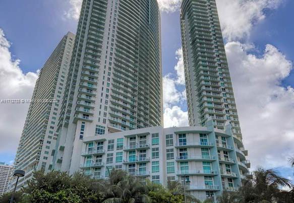 Breathtaking direct water views of Miami beach and Biscayne Bay from every room in an amazing location across from Margaret Pace Park with large windows, high ceilings, new hard flooring and balcony revealing ample light and waterfront views. Modern open-concept 1BD/1BA on a high floor is centrally located just minutes from the Arts & Entertainment District and a short ride to the Design District, Wynwood, Downtown Miami, Brickell and South Beach. Italian kitchen cabinetry, washer/dryer, assigned parking space, two swimming pools, gym, spa, club room, 24 hour concierge, billiards, theater room, 24 hour valet. Proof of income and credit score required.