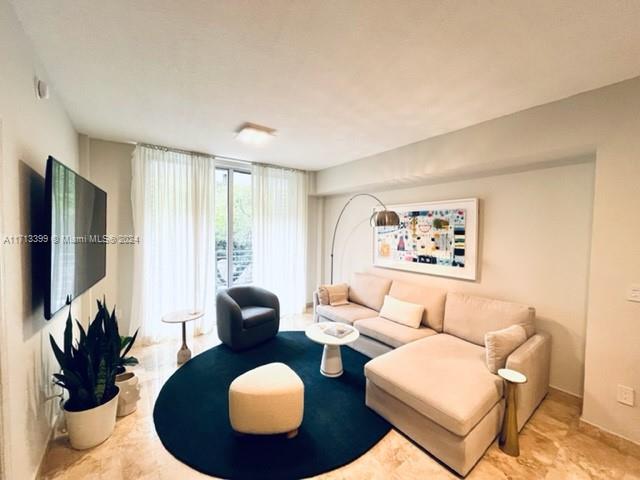 This beautiful, fully furnished 2-bedroom, 2-bathroom residence offers a luxurious living experience in the vibrant heart of Coconut Grove. The unit features an open floor plan with elegant marble floors throughout, custom-built closets, and sleek Italian cabinetry. The kitchen is equipped with top-of-the-line stainless steel appliances, and the unit includes an in-unit washer and dryer for added convenience.  Amenities include: Pool, Gym, Sauna.
One assigned parking space is included. The building is a boutique-style property, offering privacy and exclusivity.
Walk to the best restaurants, shops, and cinemas, and experience the unique lifestyle Coconut Grove has to offer!
Available from February 2025 for a 10-month lease. No pets allowed.