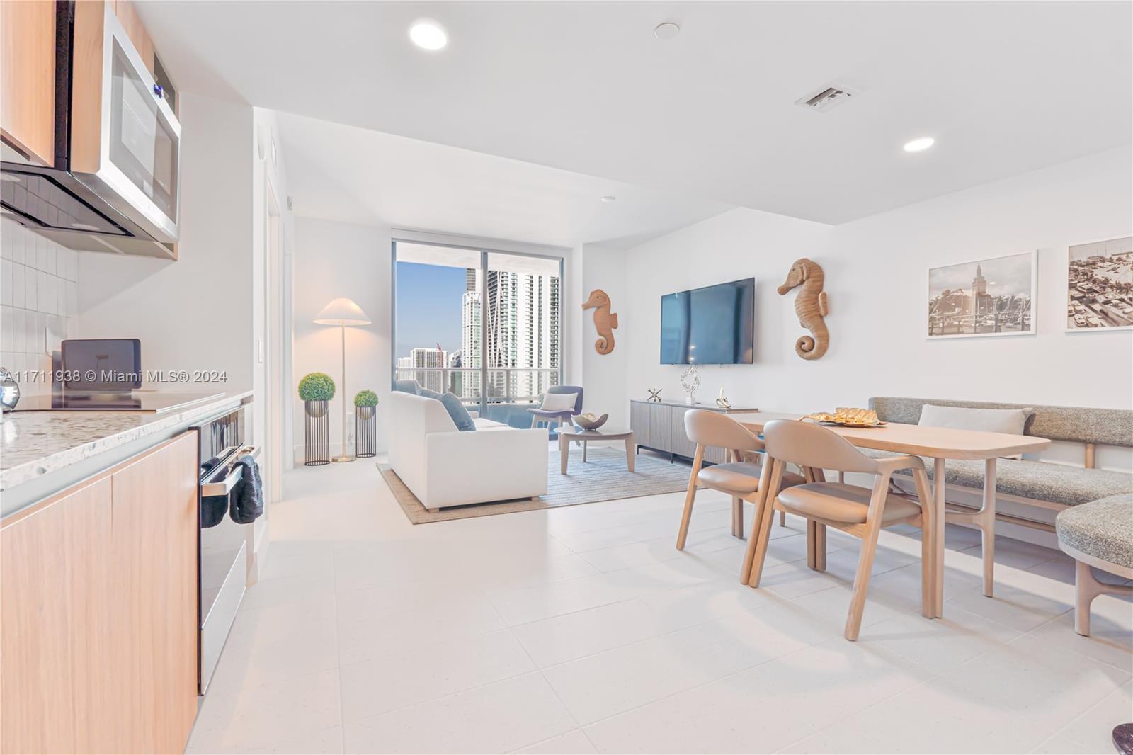 REDUCED SELLER MOTIVATED !! ALL OFFERS WILL BE CONSIDERED .....Embrace urban luxury at 601 NE 1st Ave, Unit 2409! This chic 1-bed, 1-bath condo offers modern finishes, a spacious balcony with stunning city views, and top-notch amenities. Located in the heart of Downtown Miami, enjoy easy access to dining, shopping, and entertainment. Perfect for those who love the vibrant city life! Located just steps from Miami World Center, Bayside, Brightline Station, and Kaseya Arena, and close to the world’s largest cruise port, this property benefits from high occupancy rates and premium nightly rates. It's the first building purposely designed, built, and licensed for homesharing. Fully furnished and equipped residence come with the luxurious services and amenities of a hotel.