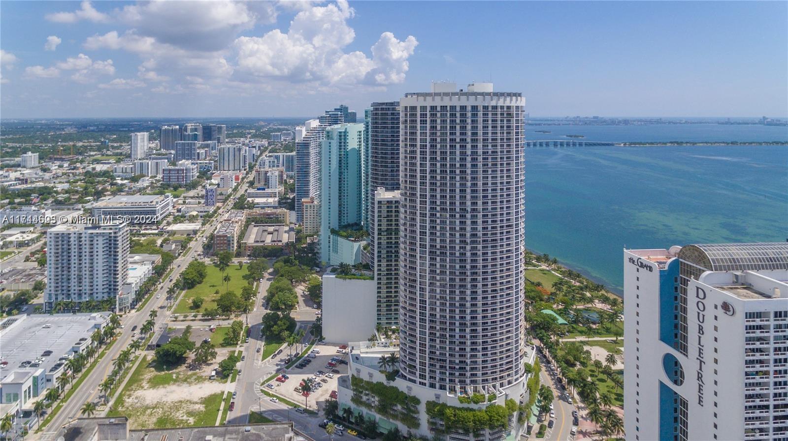 Welcome to luxury living at Opera Tower in Miami's vibrant Edgewater neighborhood. This 1-bedroom, 1-bathroom unit offers stunning views of Biscayne Bay and the city from its spacious balcony. Enjoy high-end finishes, including floor-to-ceiling glass windows, granite countertops, and stainless steel appliances. The building's amenities feature a state-of-the-art fitness center, a swimming pool, whirlpool spas, and a 24-hour concierge. Conveniently located near Margaret Pace Park, shops, and restaurants, walking distance from Publix, Opera and Art District with stunning views. This condo is a perfect urban retreat.