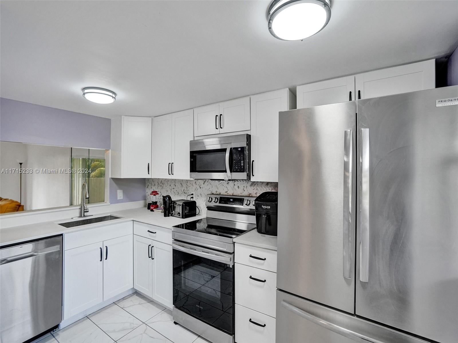 6075 N Sabal Palm Blvd #212, Tamarac, Florida image 1