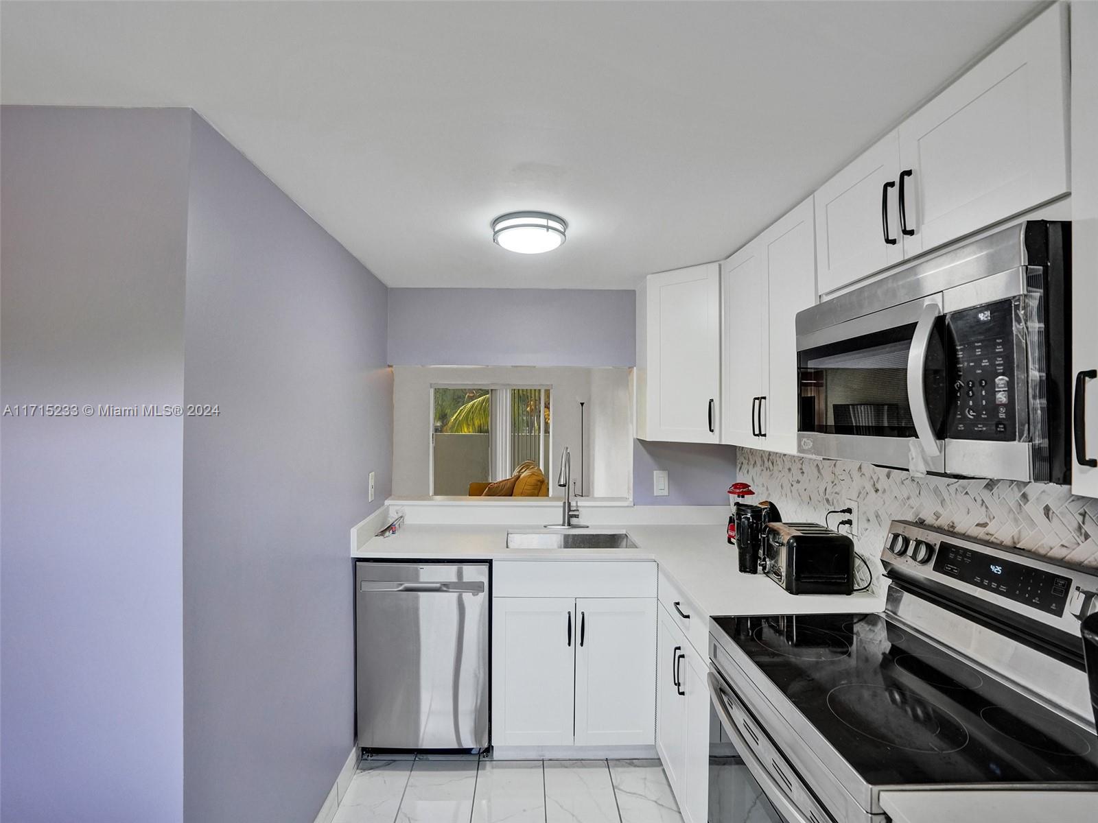 6075 N Sabal Palm Blvd #212, Tamarac, Florida image 2