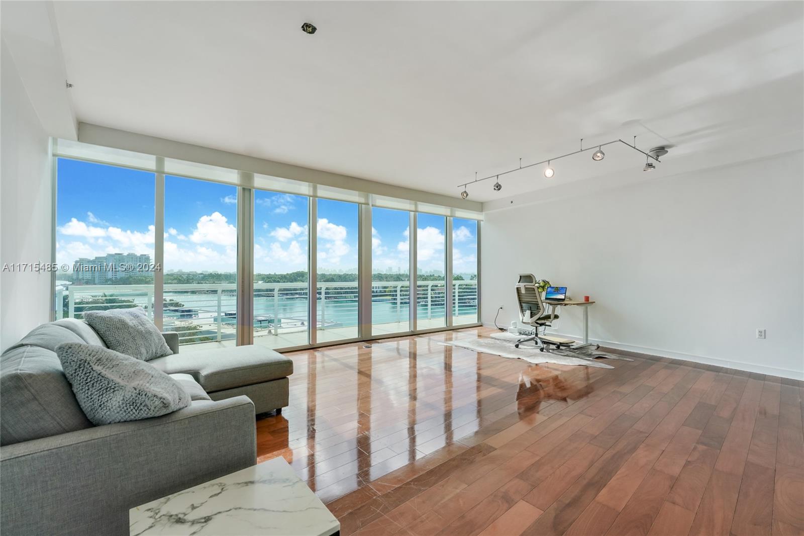 Just Listed 1712 SF, 3 bed/3bath Penthouse, with private rooftop terrace at the waterfront Regatta in Miami Beach. Spacious and unique, this PH offers gorgeous intracoastal, skyline, bay, and ocean views, contemporary finishes, open kitchen with large island, Master walk in closet, Master bath with separate shower and jacuzzi tub, impact glass, wood floors, high ceilings, and 2 tandem parking spaces. 950+SF of exterior space includes a terrace that spans the living area and Master, and a large private rooftop terrace with hot tub and shower accessed from within the PH to enjoy the stunning sunsets. The boutique 2006 Regatta enjoys a waters edge pool, 9 slip marina, gym, sauna, hot tub, and concierge. Ideal location, midway between South Beach and Bal Harbour, steps to the beach.